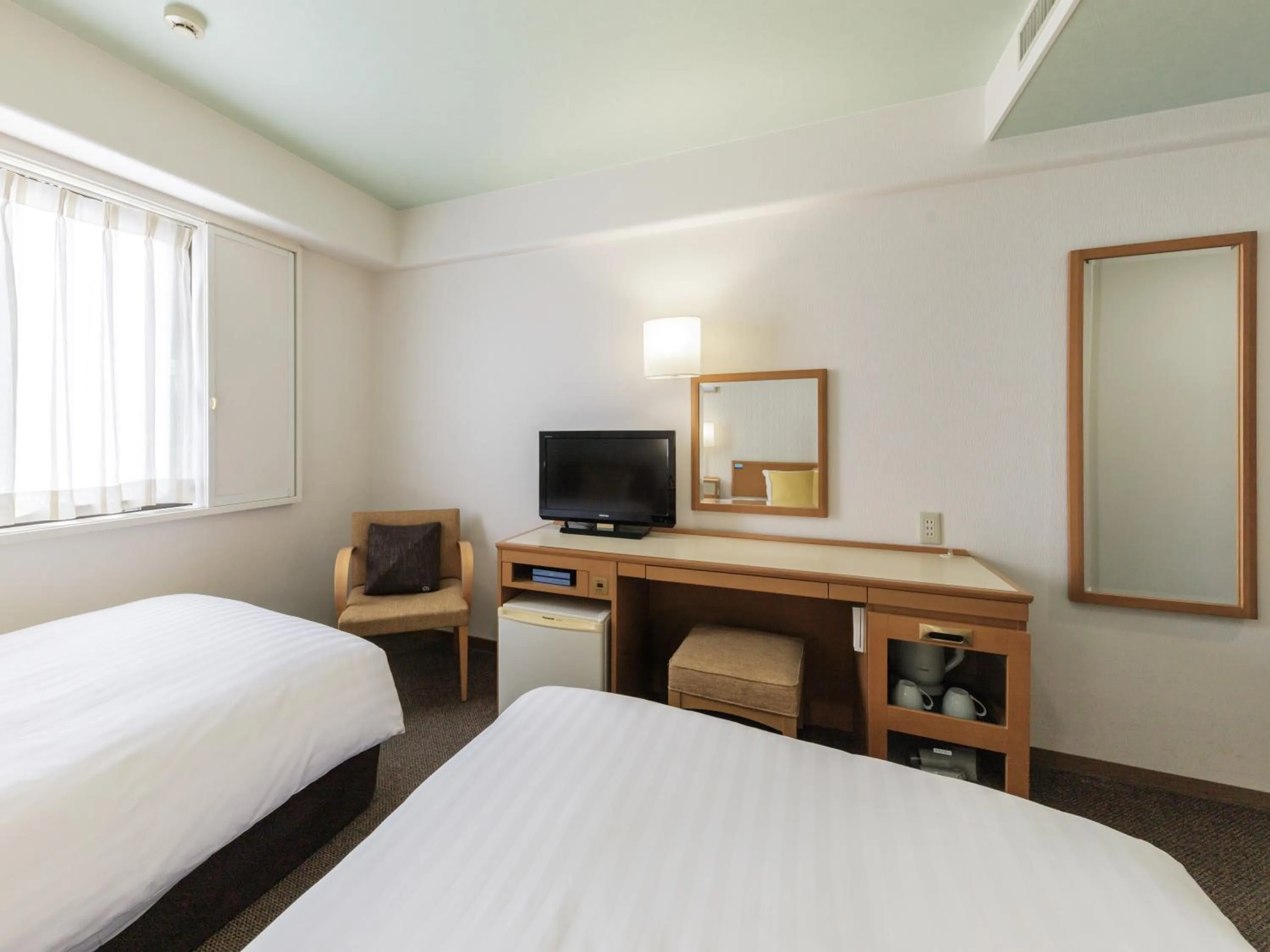 Photo of the whole room, Bed in Nishitetsu Inn Tenjin