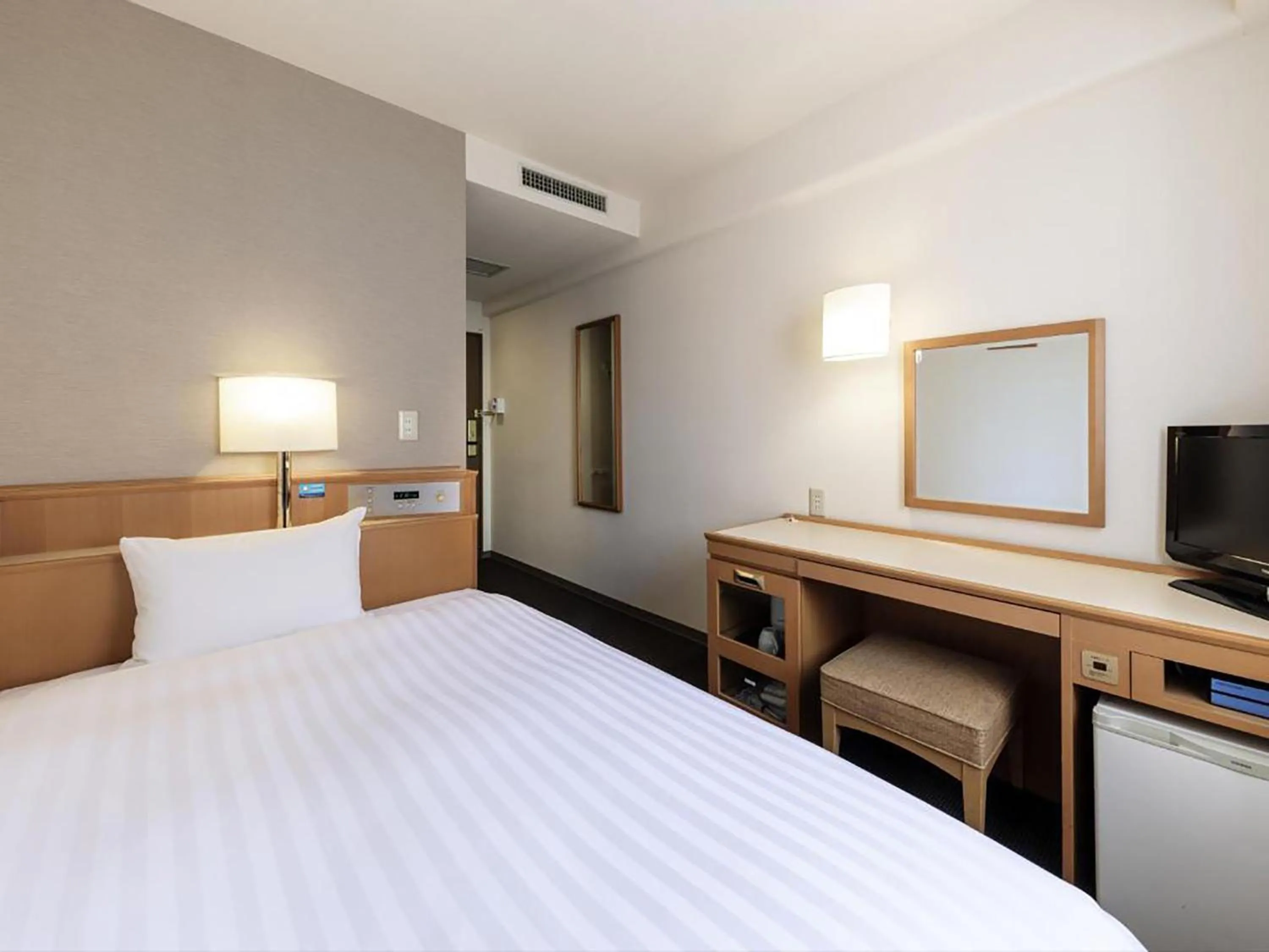 Photo of the whole room, Bed in Nishitetsu Inn Tenjin