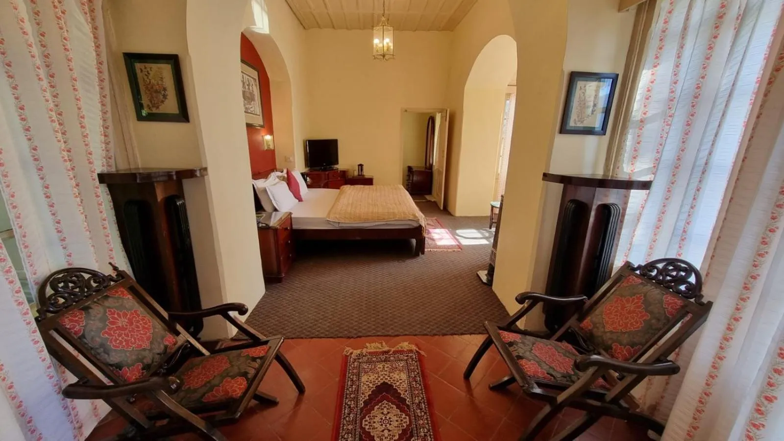 Bed in Hotel Padmini NIvas