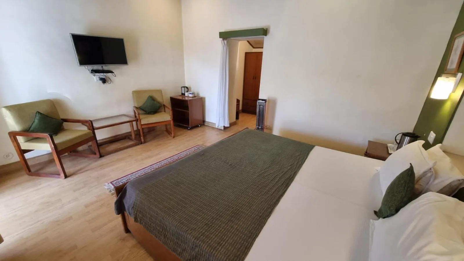 Bed in Hotel Padmini NIvas