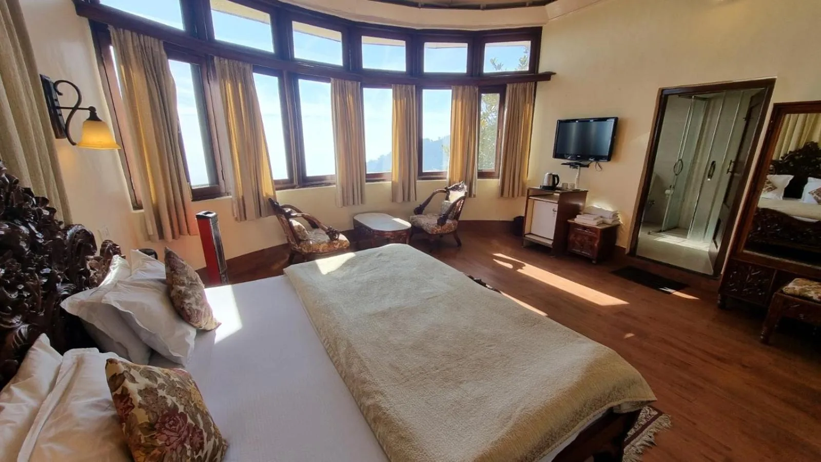 Bed in Hotel Padmini NIvas