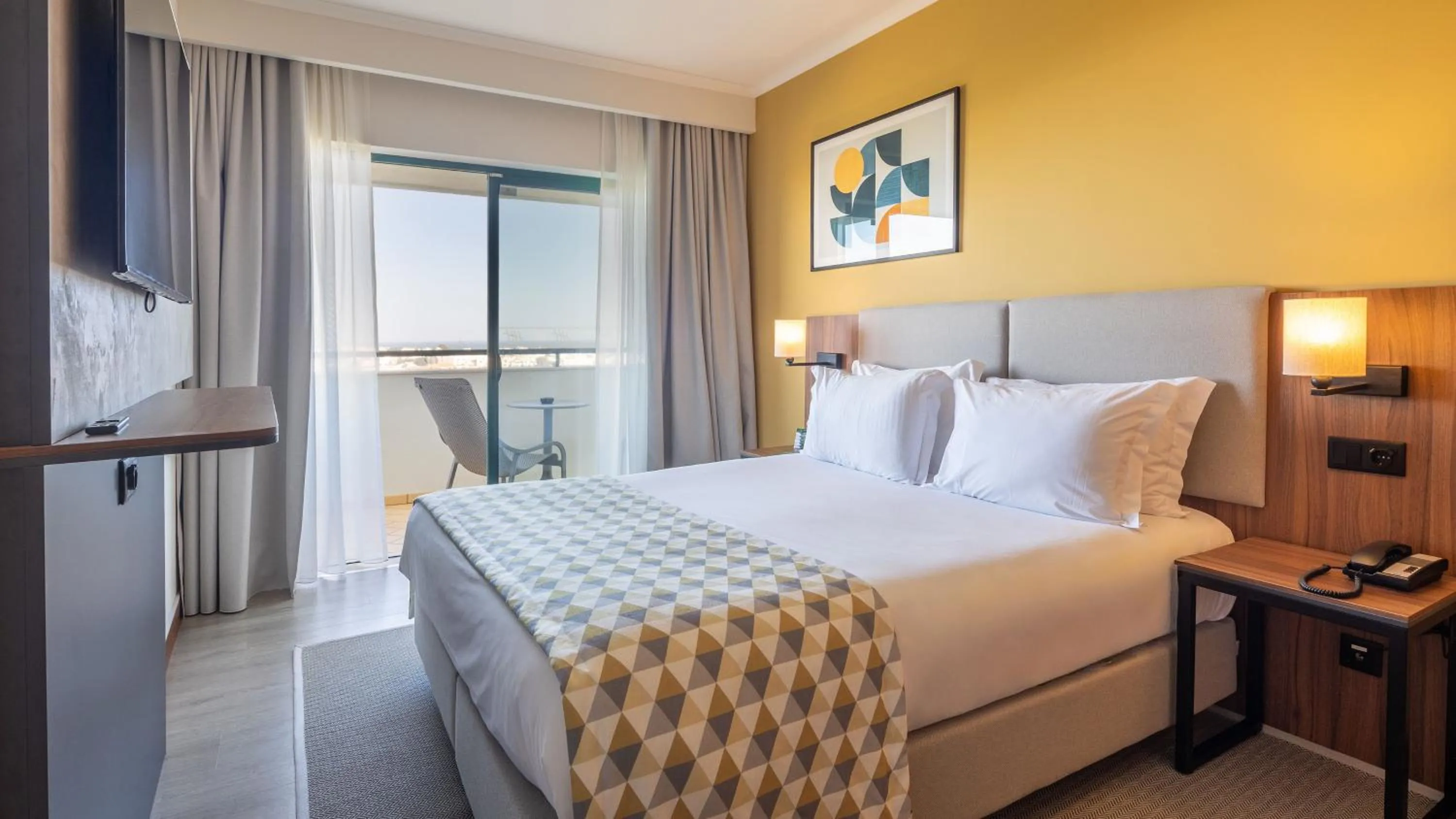 Bedroom, Bed in Holiday Inn Algarve Albufeira by IHG