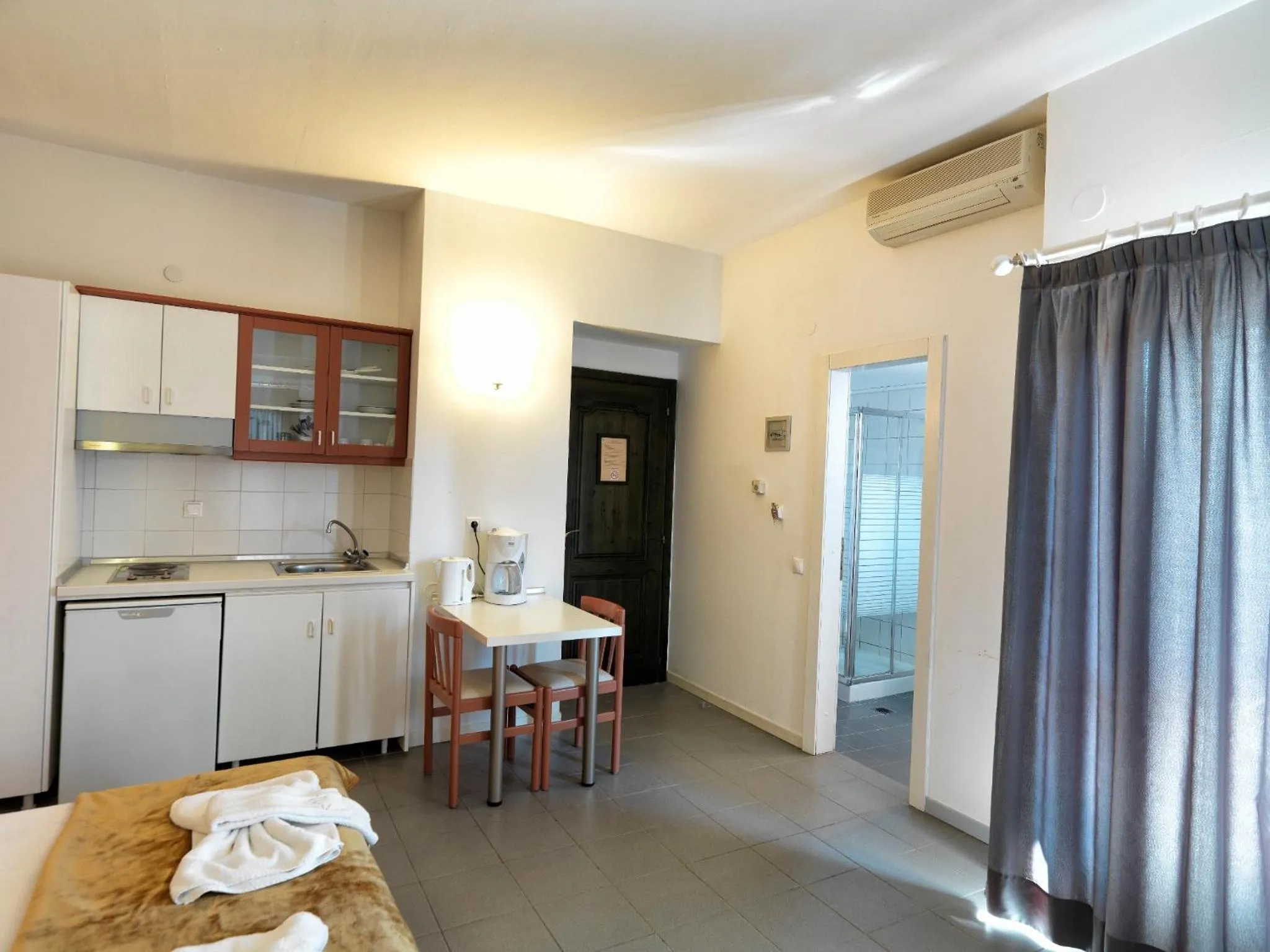 Kitchen or kitchenette in Elia Apartments