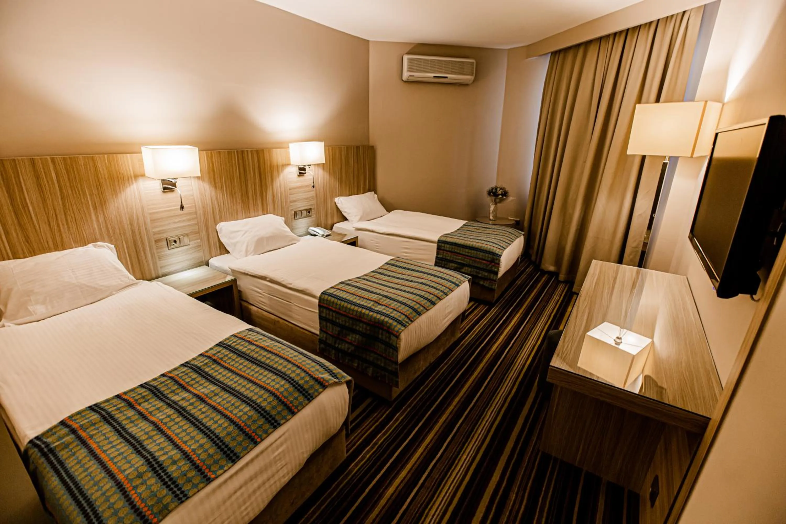 Bed in Mustafa Cappadocia Resort