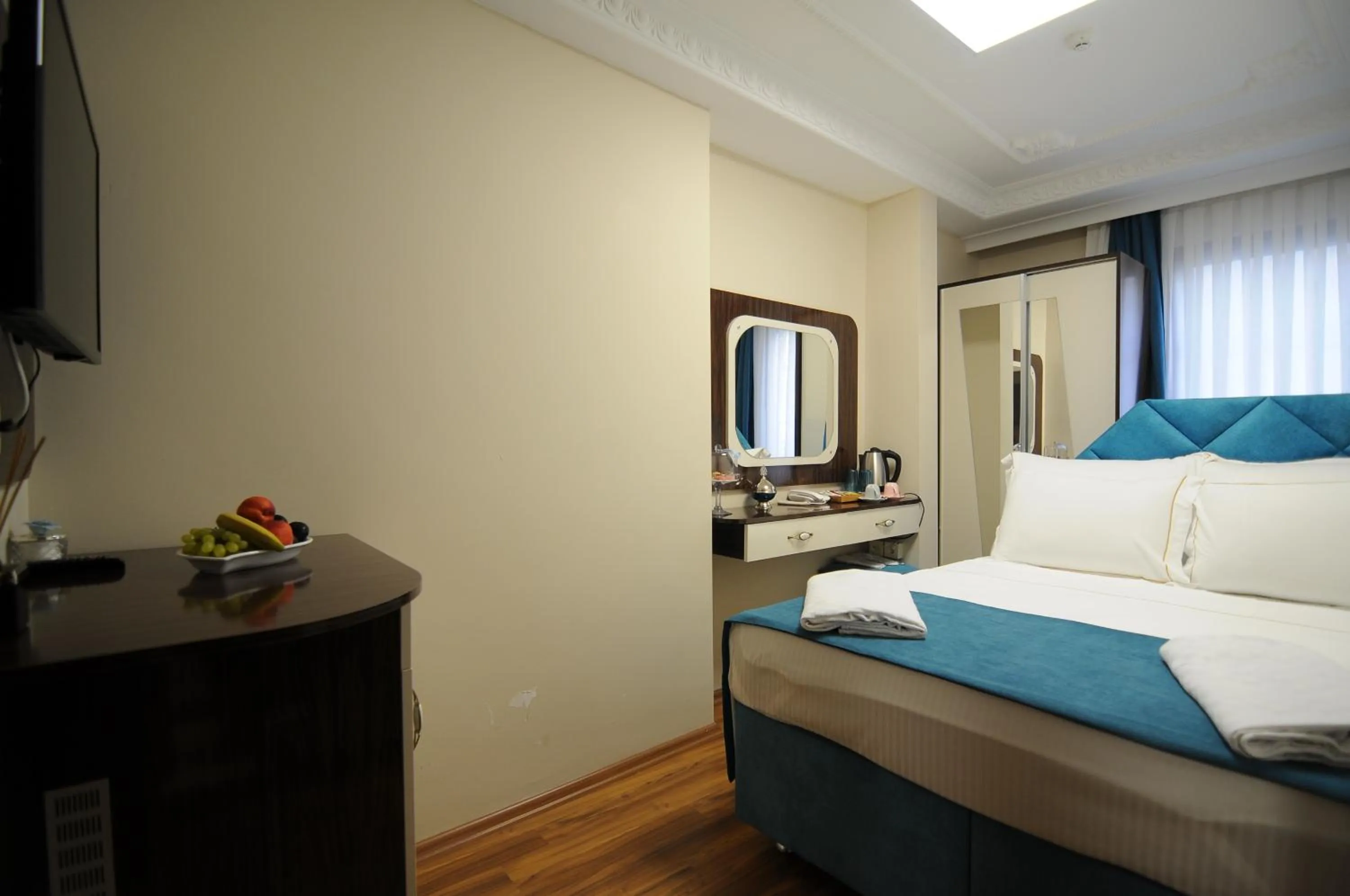 TV and multimedia, Bed in Akbiyik Suite Boutique Hotel