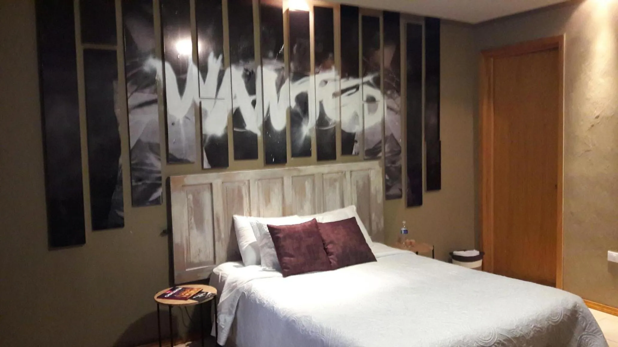 Bed in Doroteo Hotel Boutique