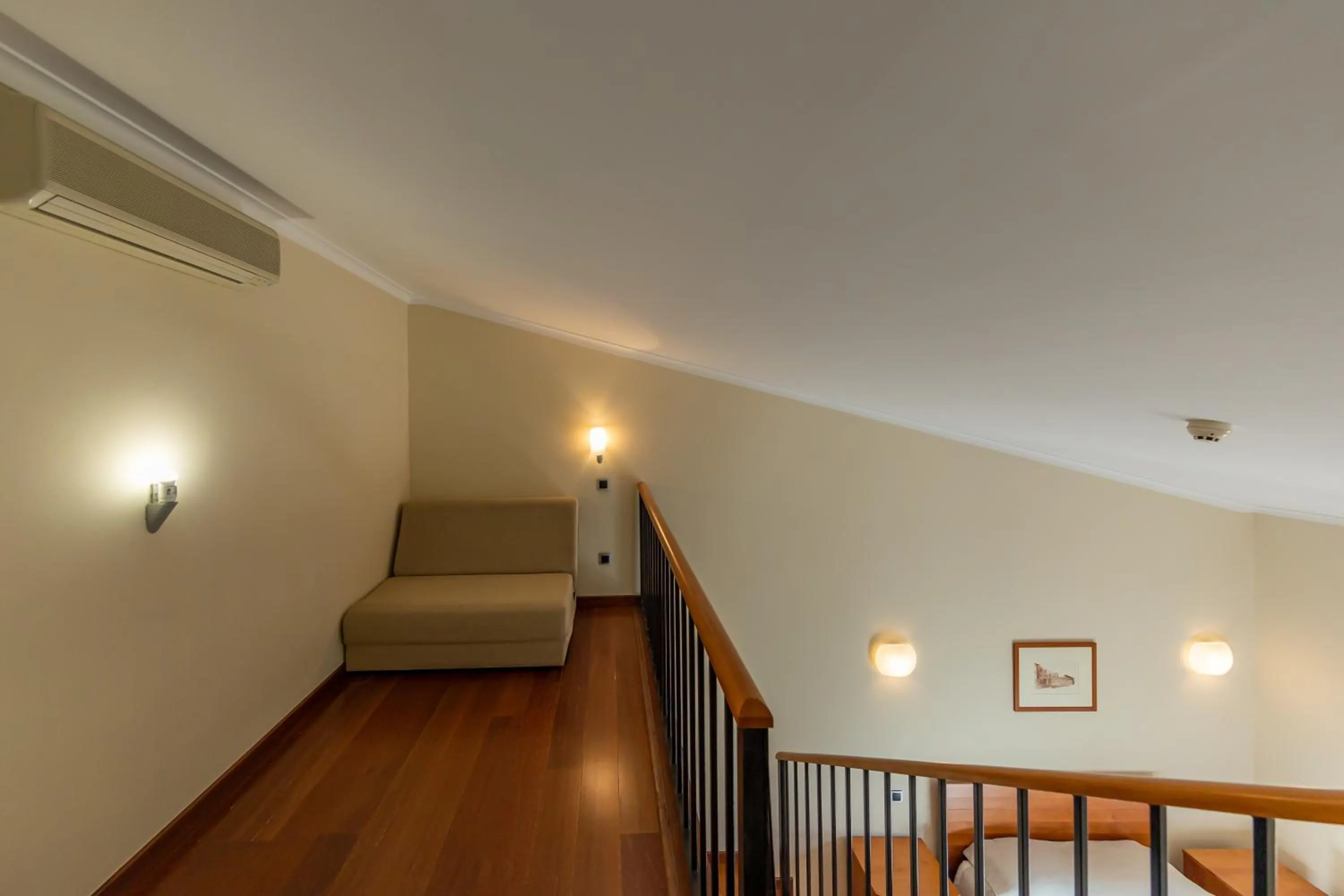 Seating area, Bed in Hotel Rural Quinta de Sao Sebastiao