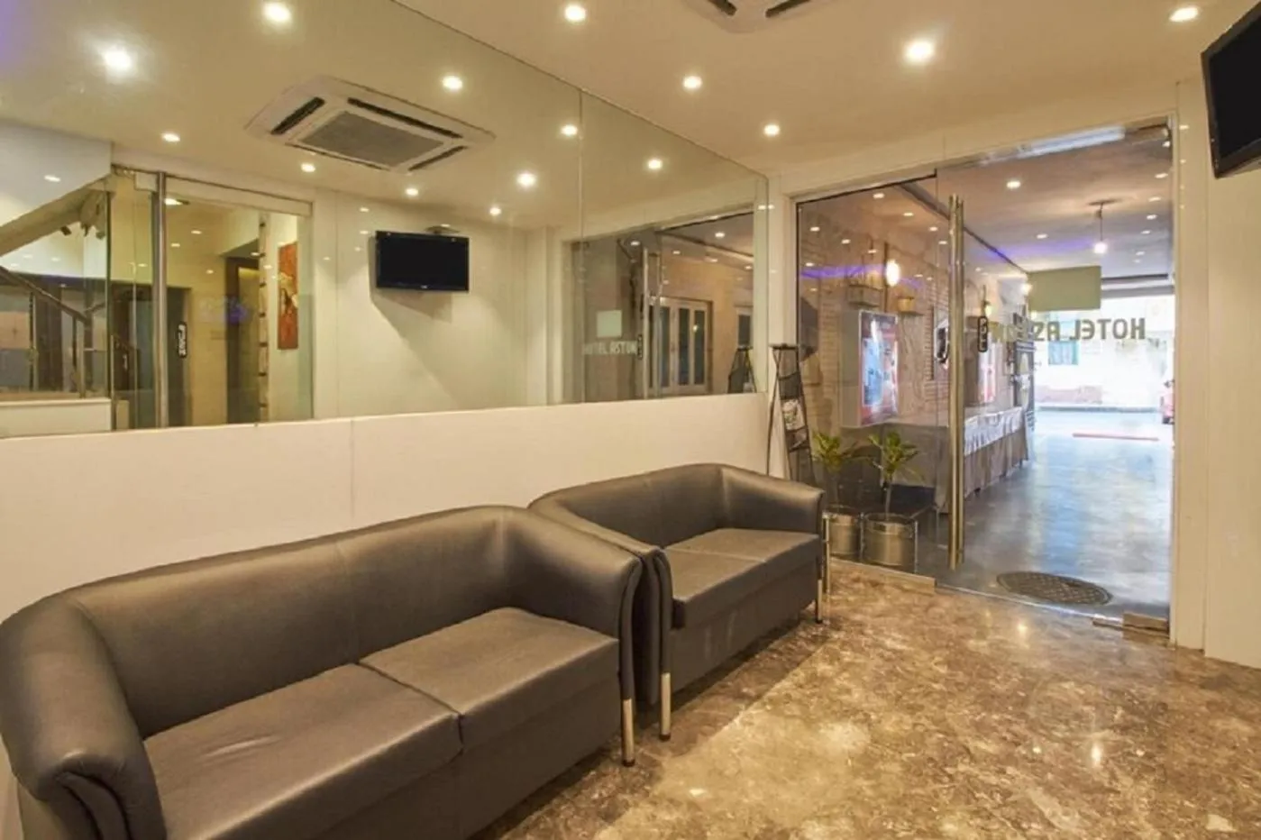 Lobby or reception in Hotel Aston