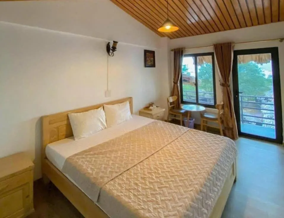 Bed in Catba Oasis Bungalows