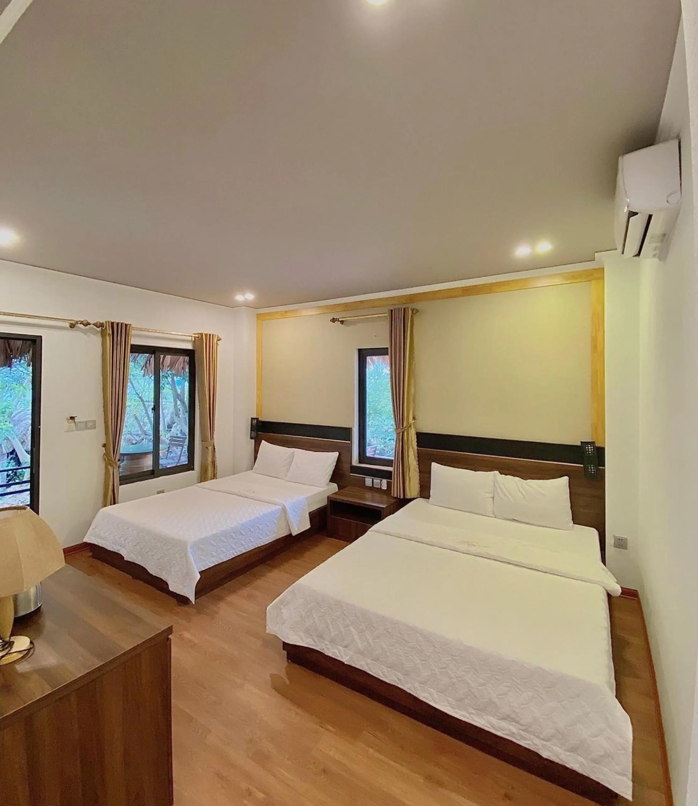 Bed in Catba Oasis Bungalows