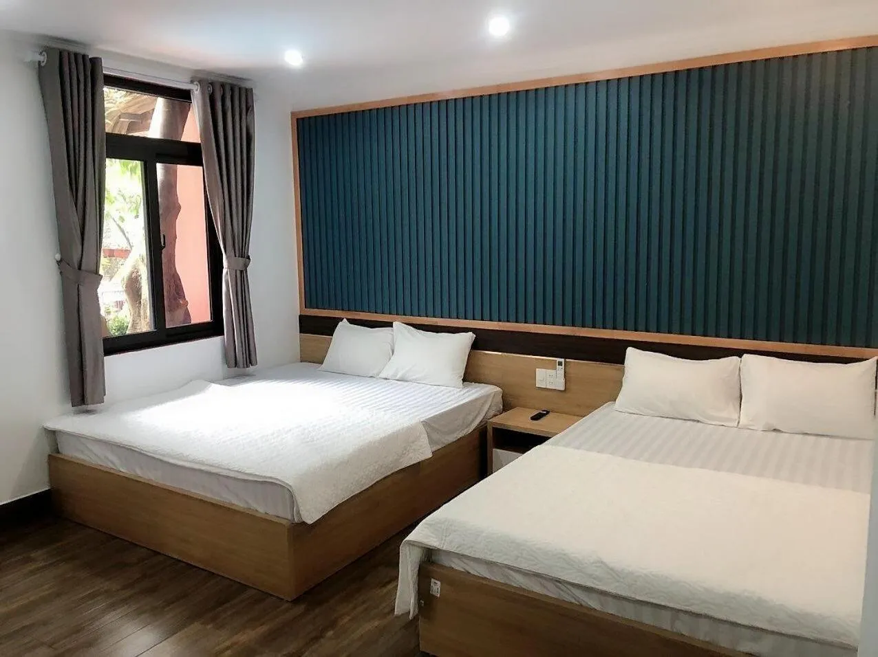 Bed in Catba Oasis Bungalows