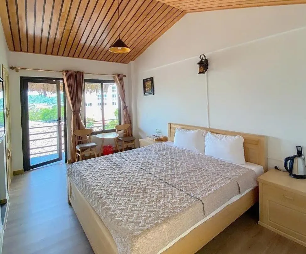 Bed in Catba Oasis Bungalows