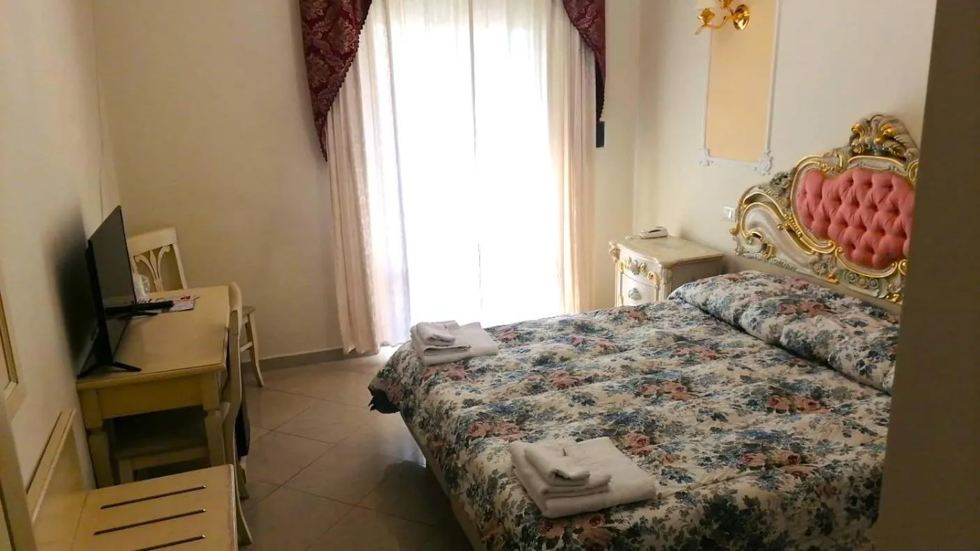 Bed in Colosseo Rooms Imperial Rome