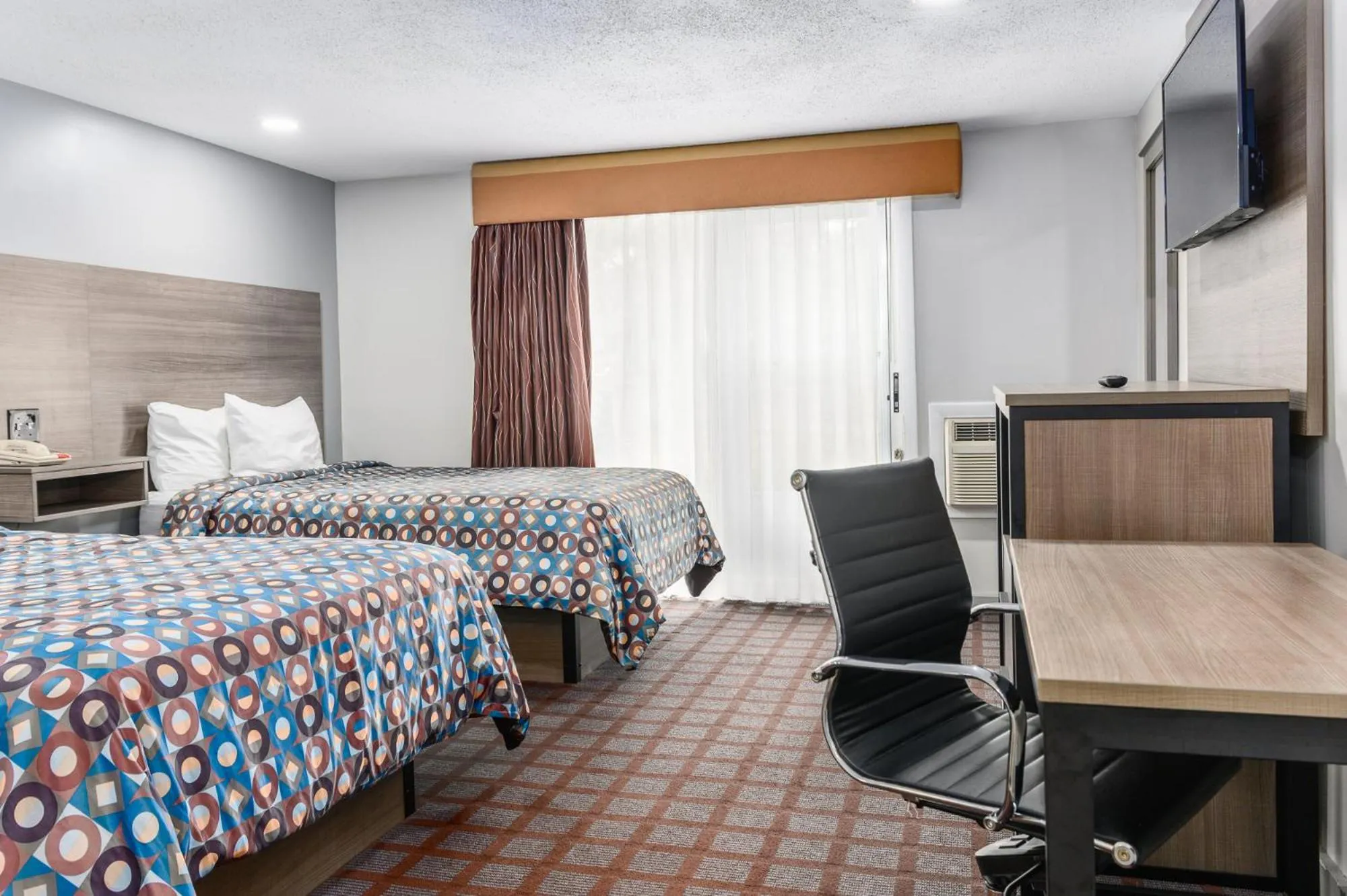 Photo of the whole room, Bed in Blue Dolphin Inn