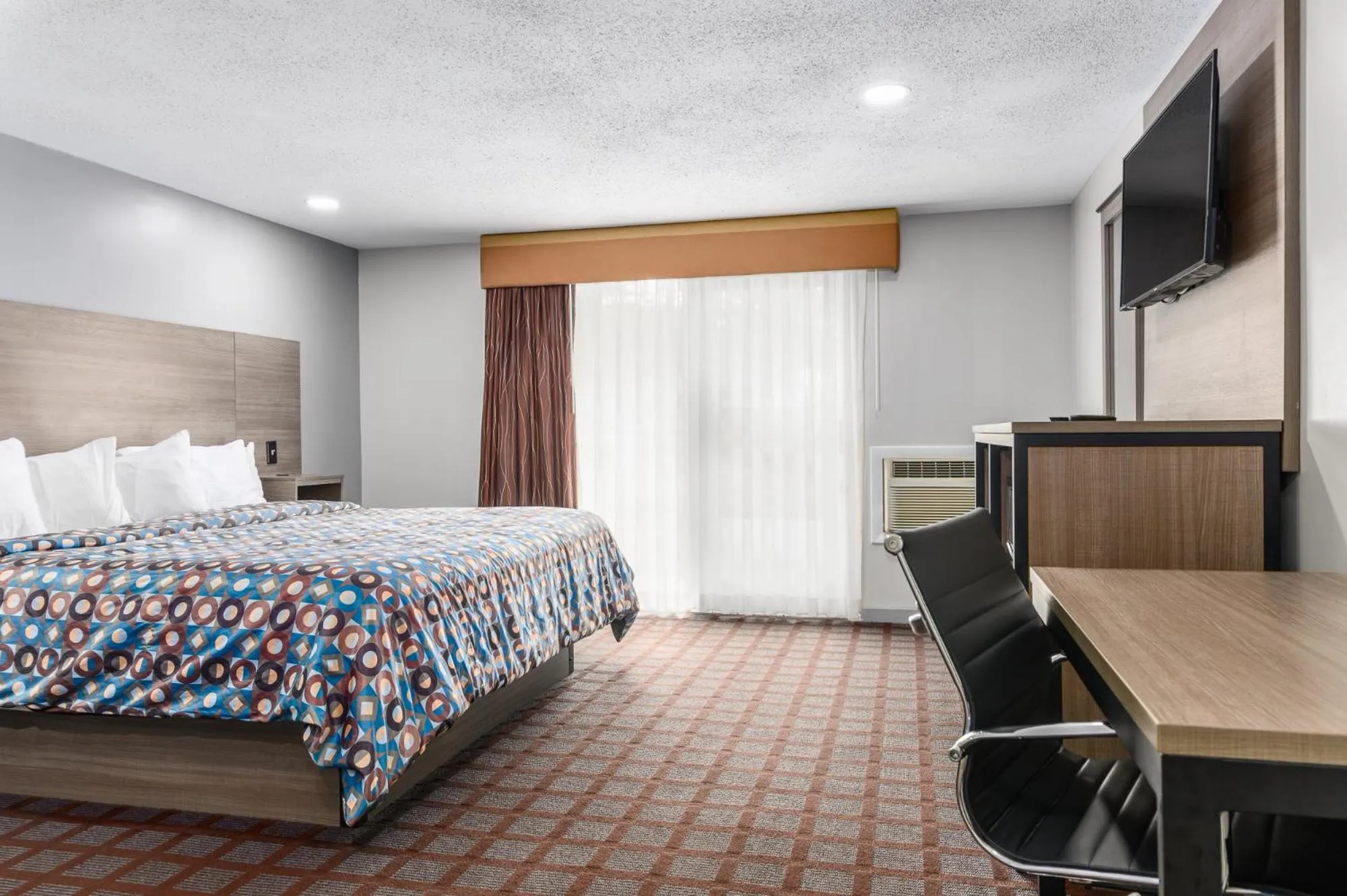 Photo of the whole room, Bed in Blue Dolphin Inn