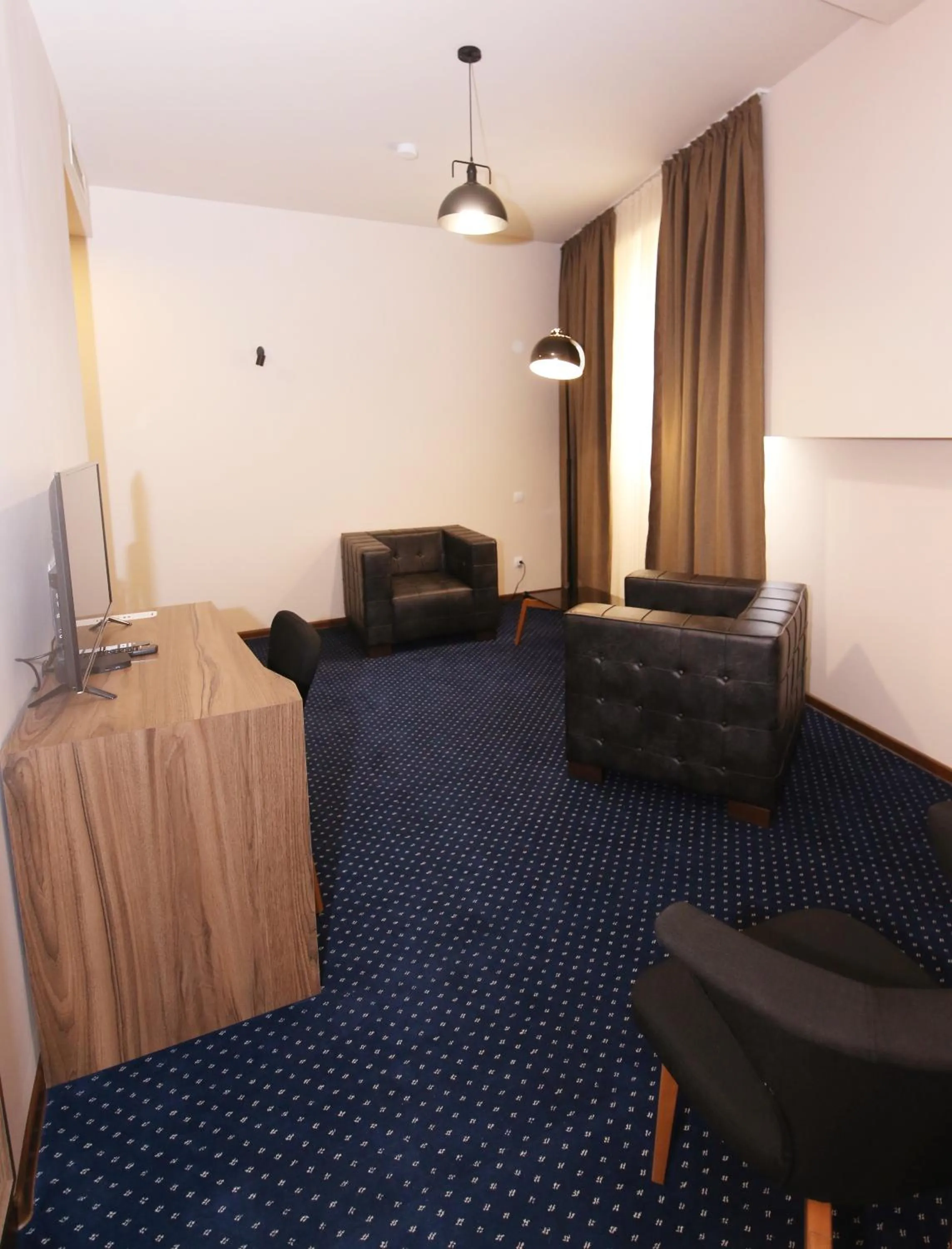 Communal lounge/ TV room in Garden Palace