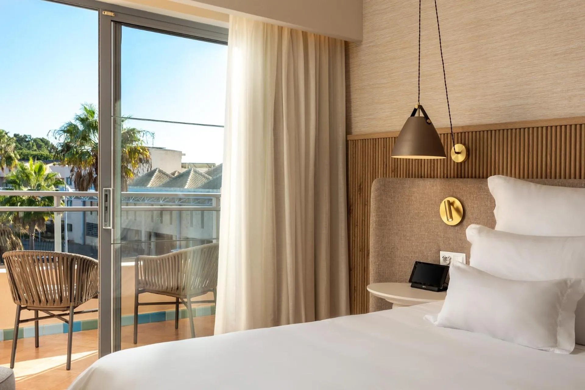 Bed in Grande Real Santa Eulalia Resort & Hotel Spa