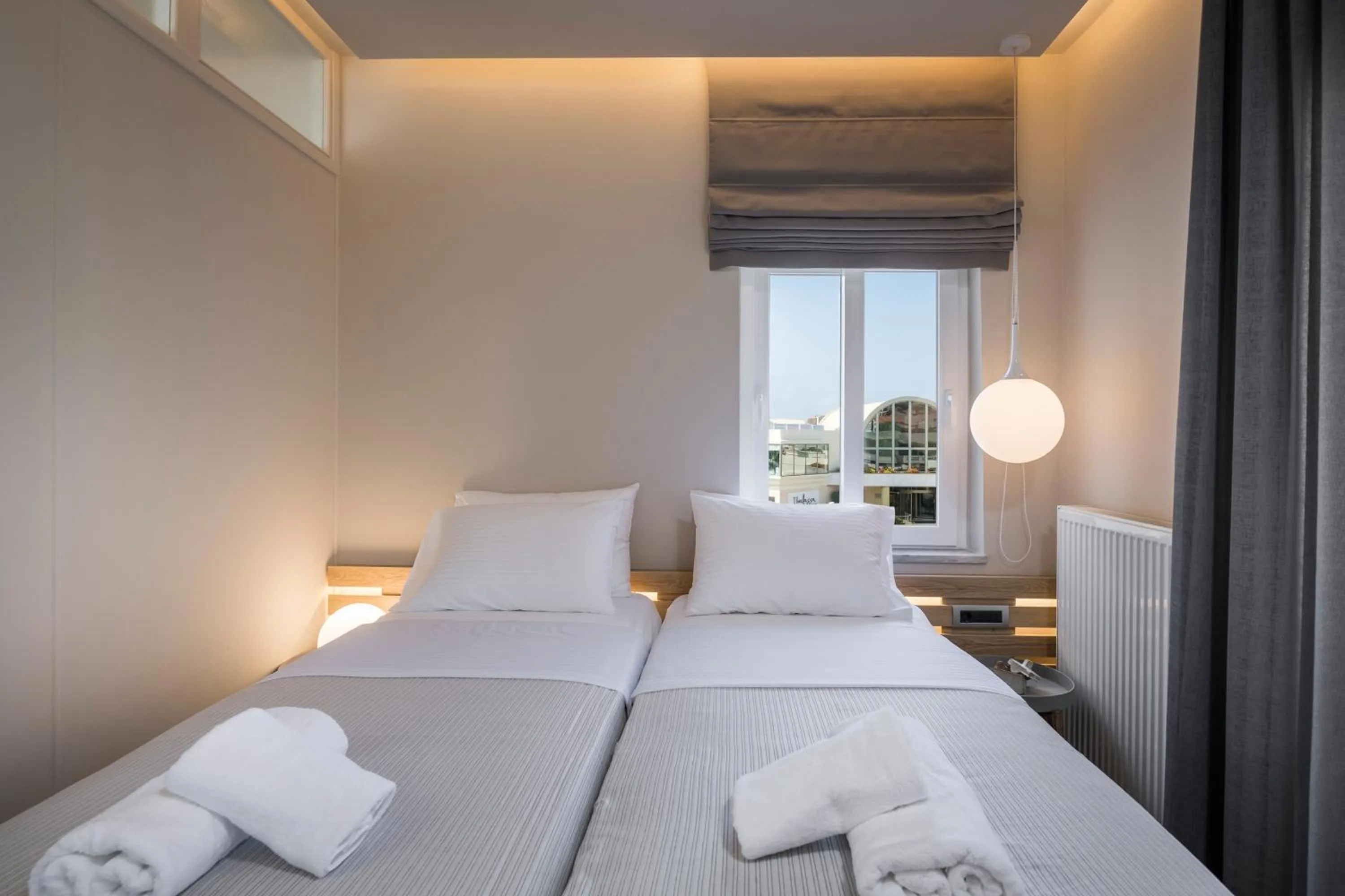 Photo of the whole room, Bed in Sun Ray Luxury Apartments