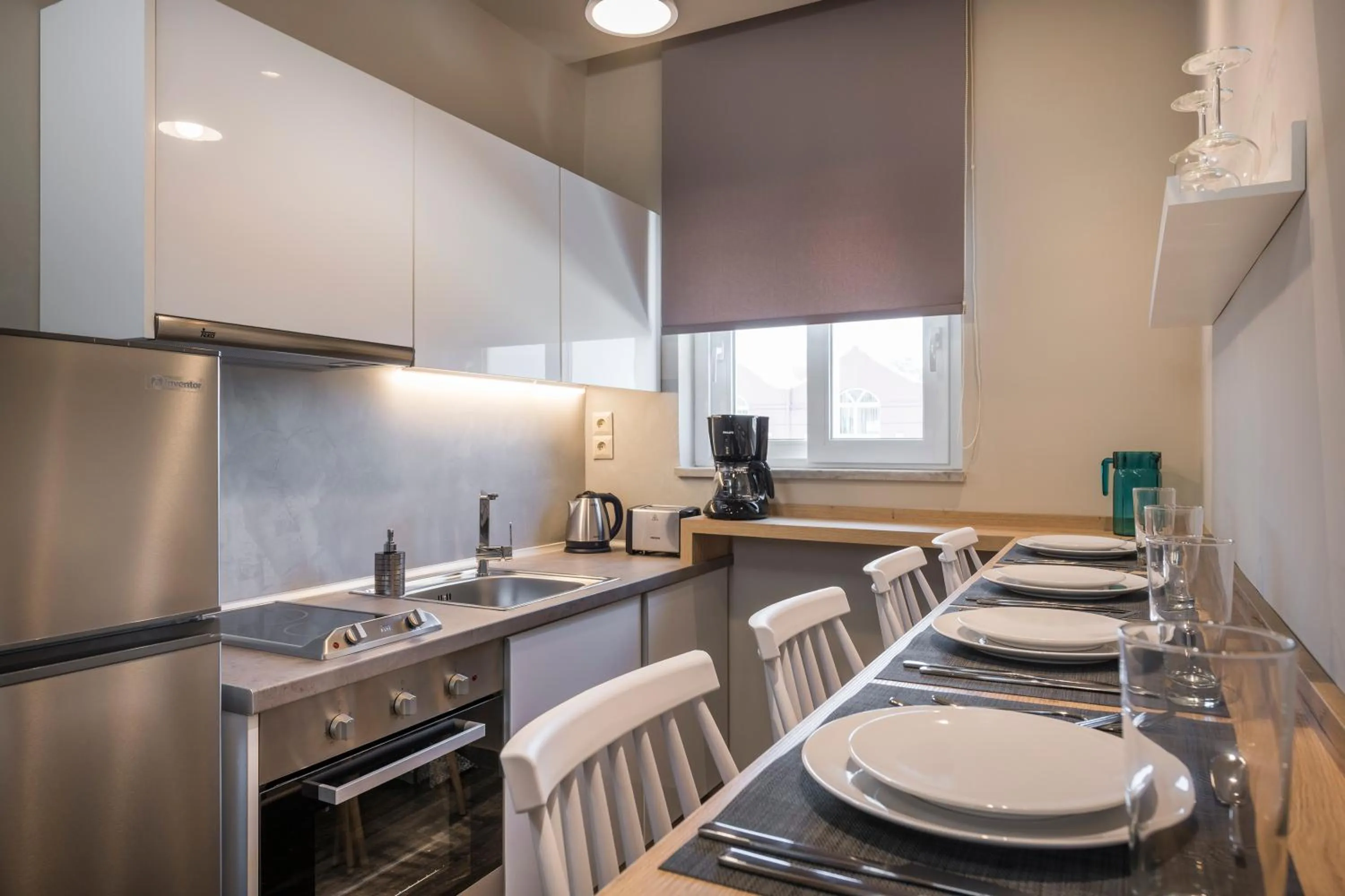 Kitchen or kitchenette in Sun Ray Luxury Apartments