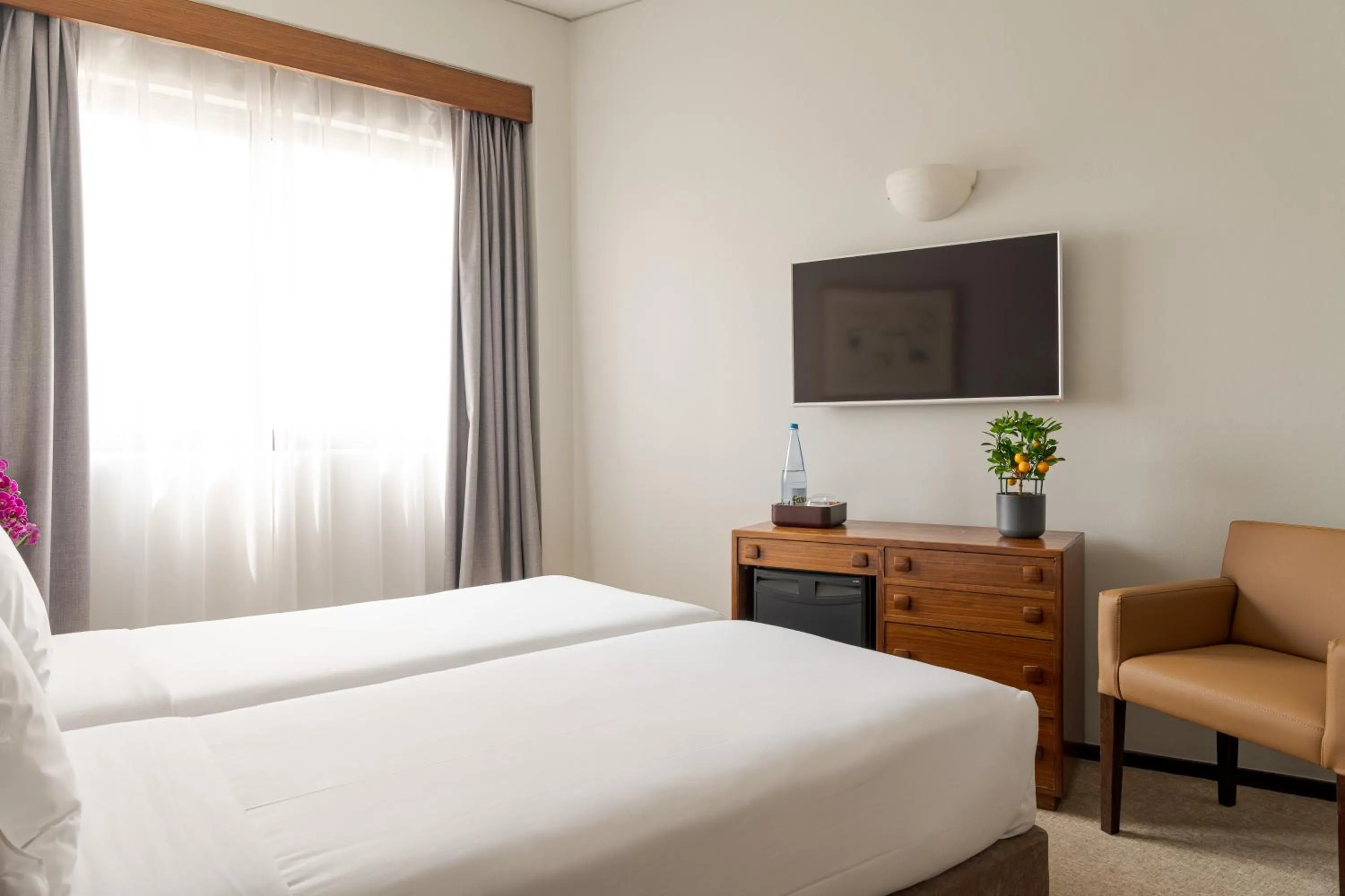 Bed in Hotel Dom Carlos Park