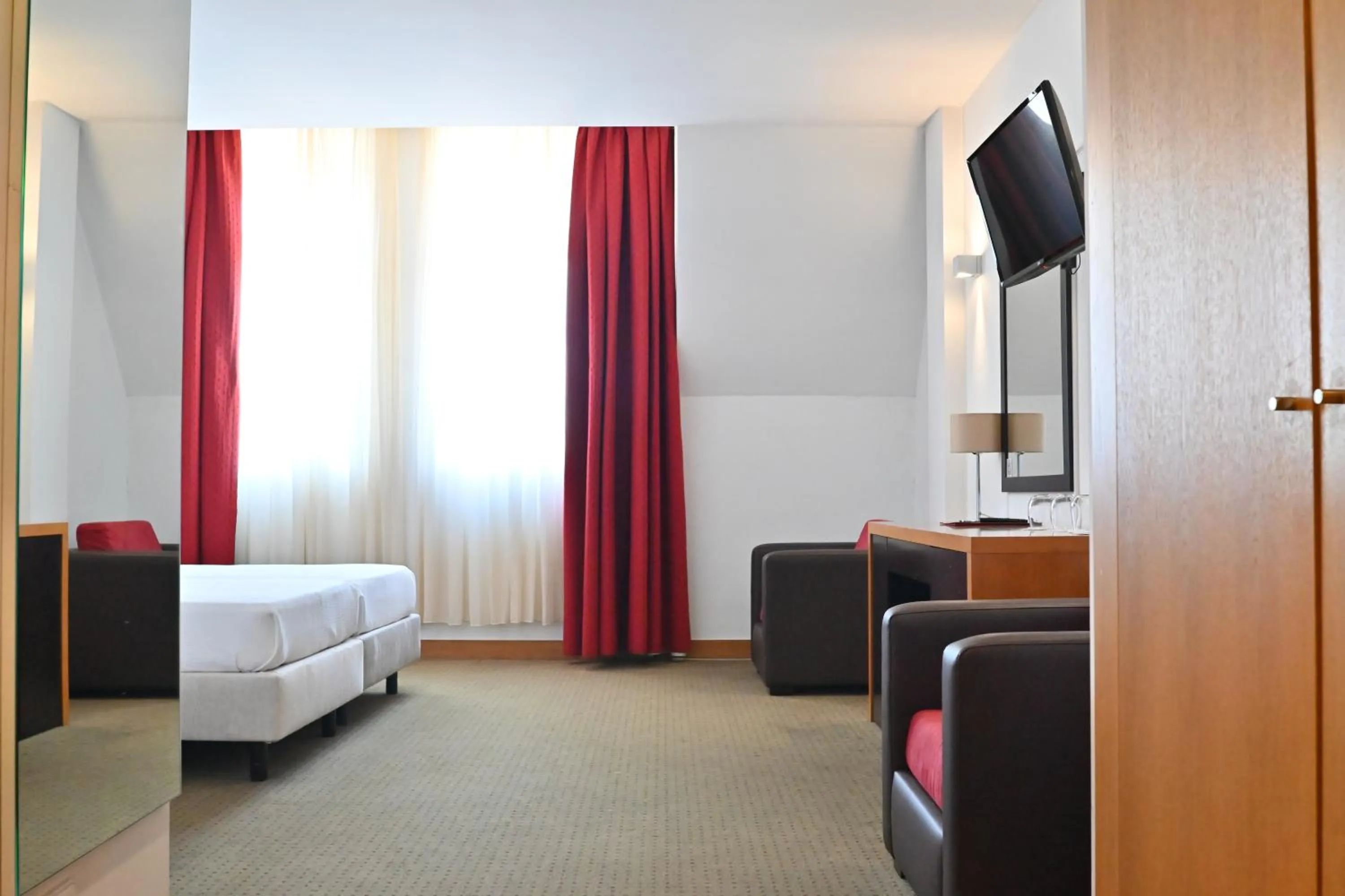 TV and multimedia, Bed in Hotel Bagoeira