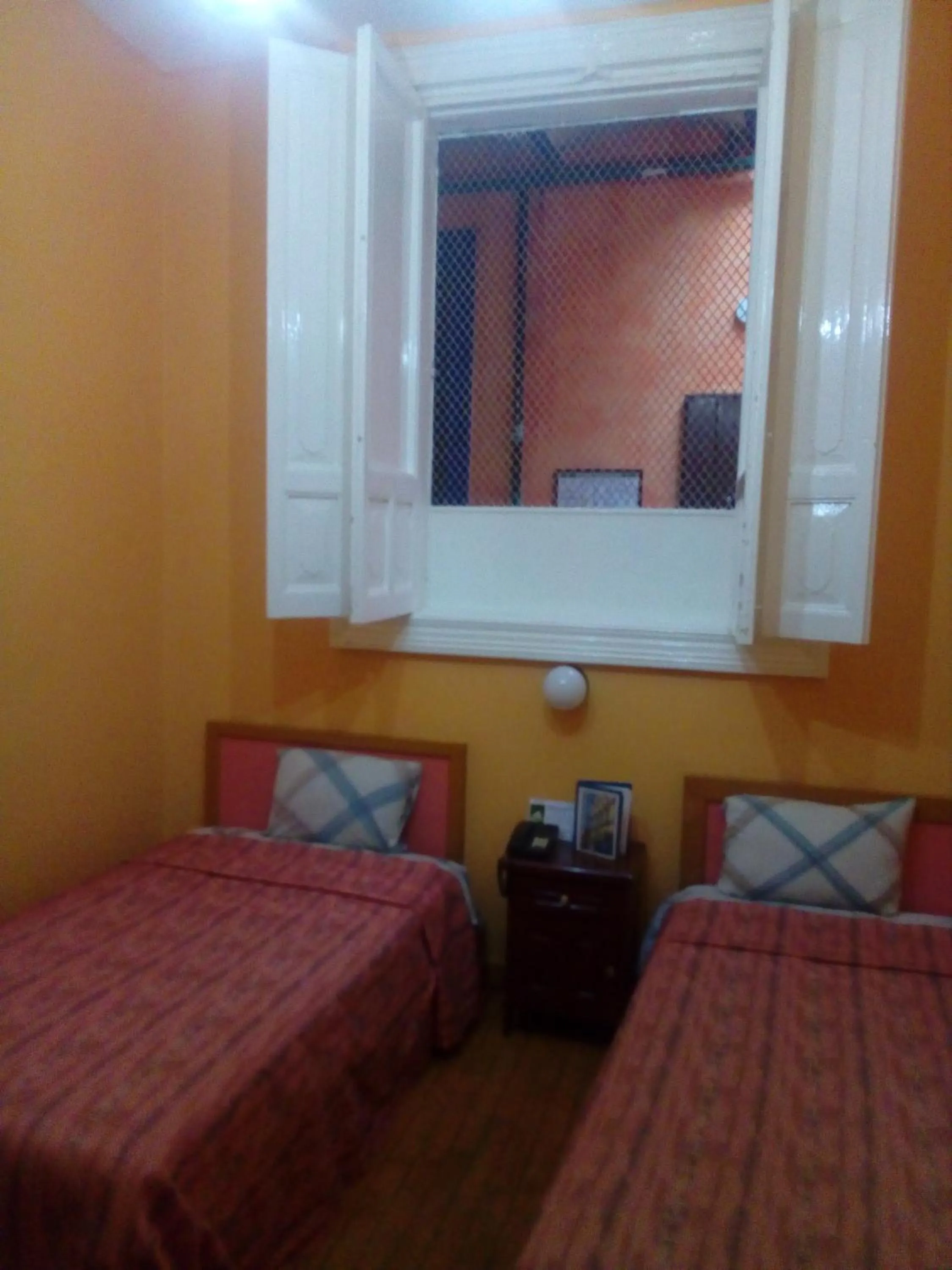 Staff, Bed in Hotel Isabel