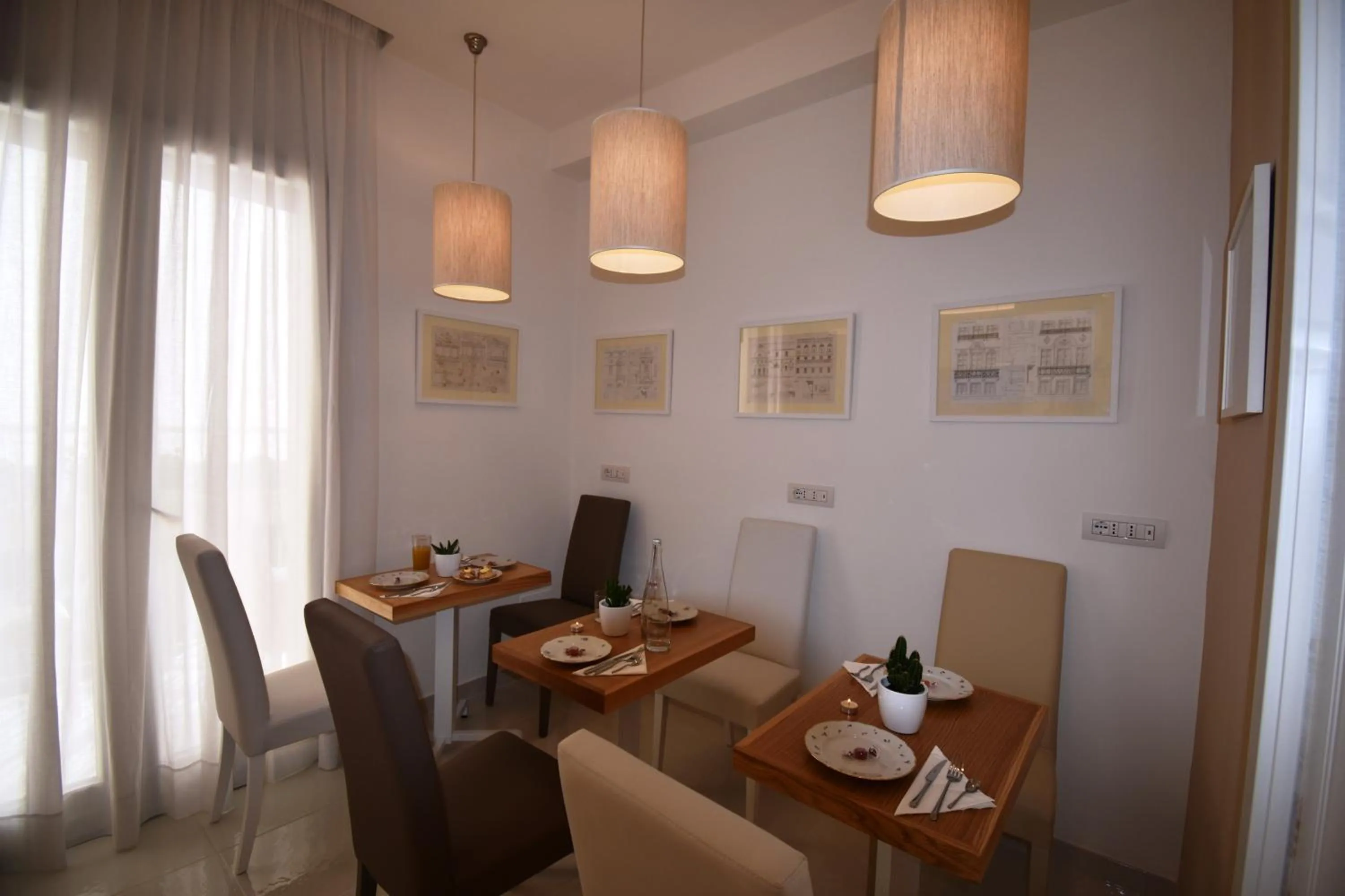 Communal lounge/ TV room in Melody Sorrento Suites