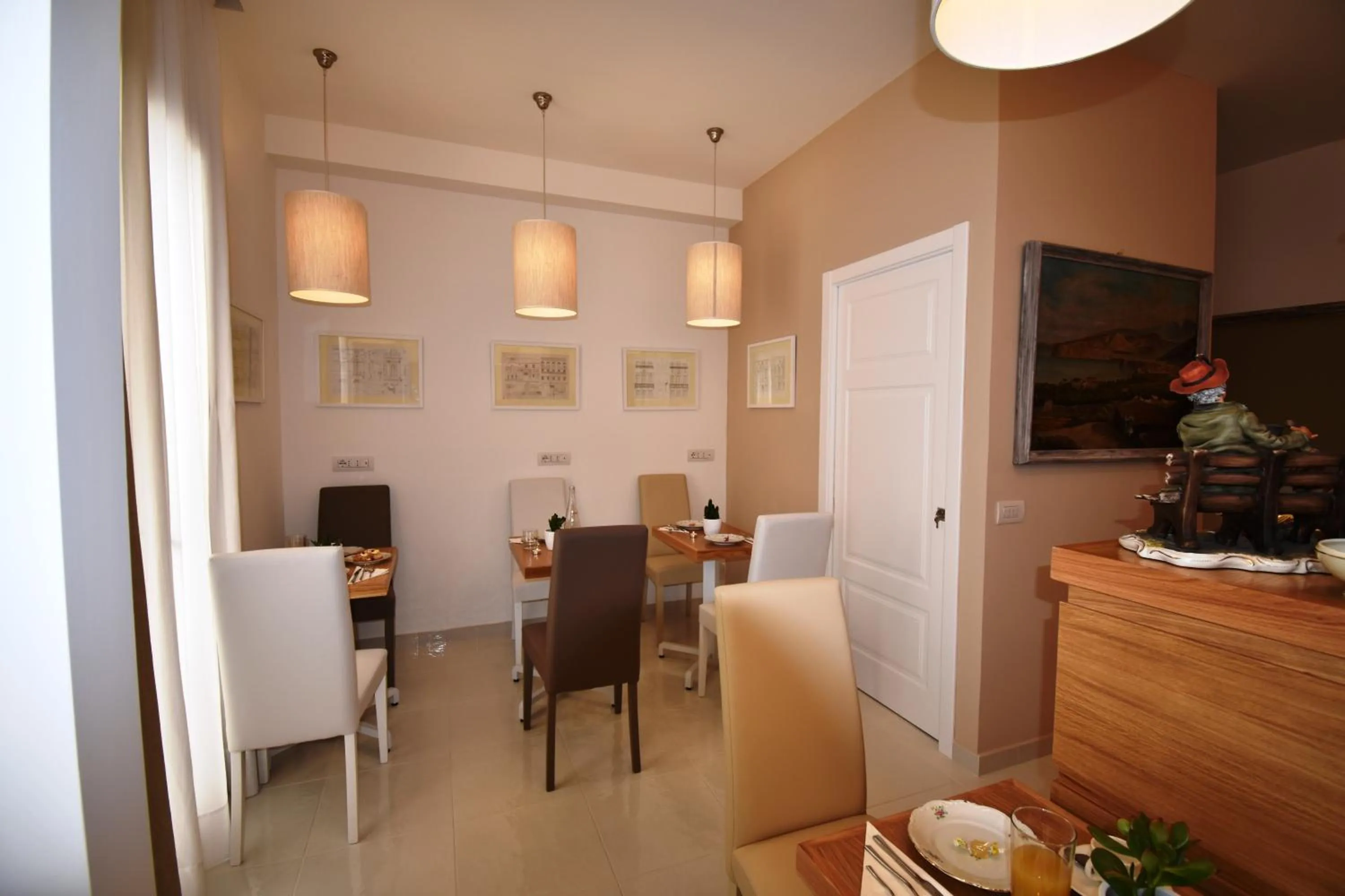 Communal lounge/ TV room in Melody Sorrento Suites