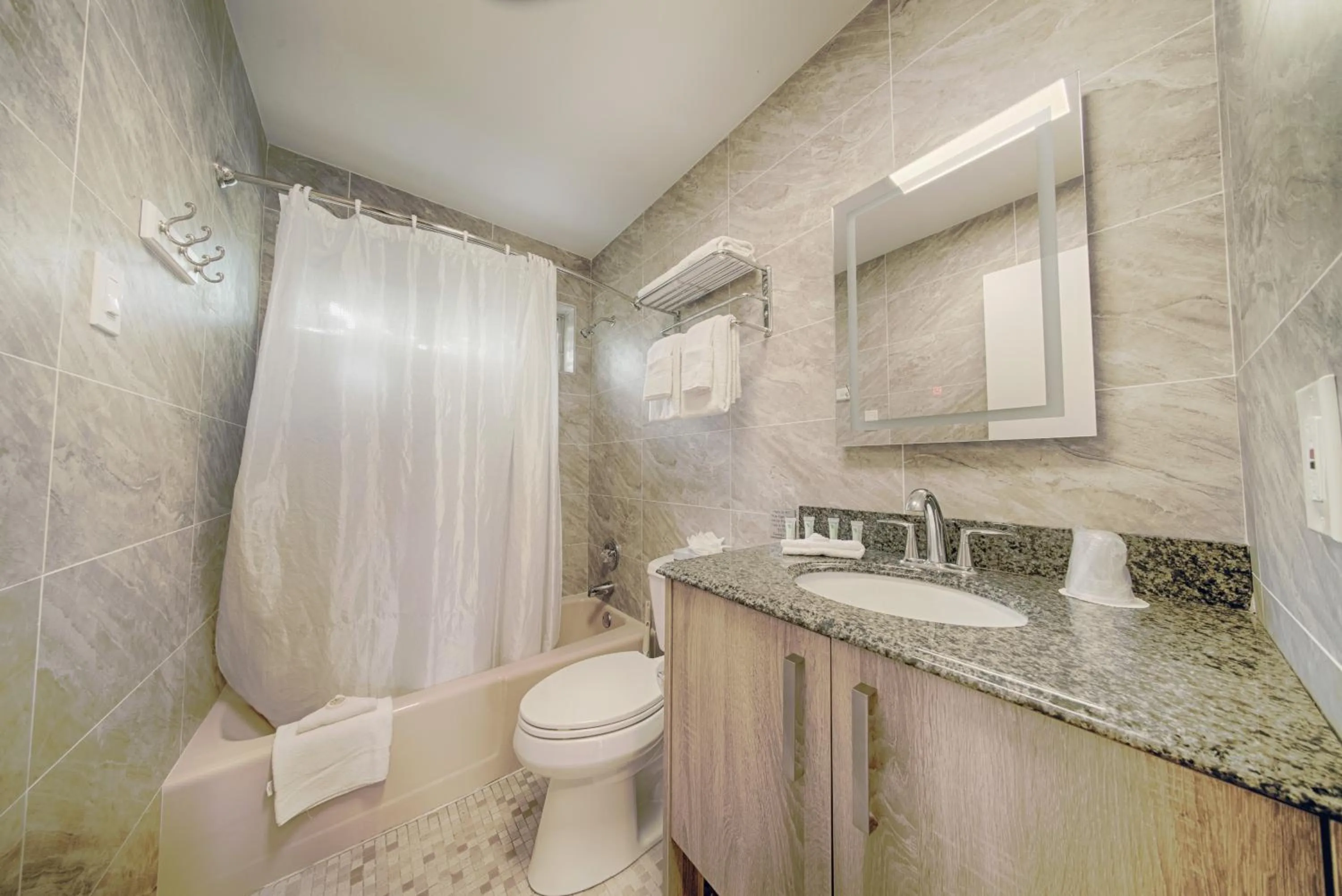 Shower in Club Lux Resort By The Beach