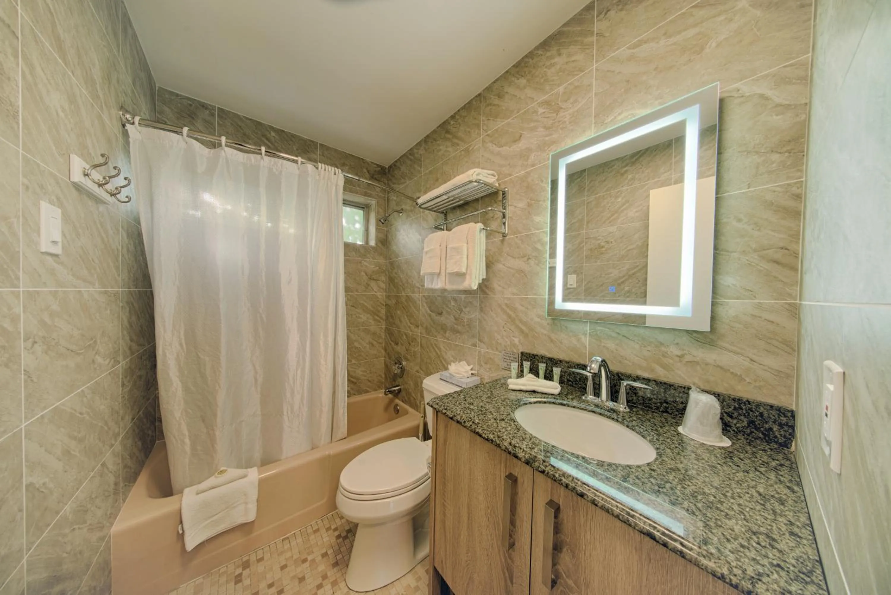 Shower in Club Lux Resort By The Beach