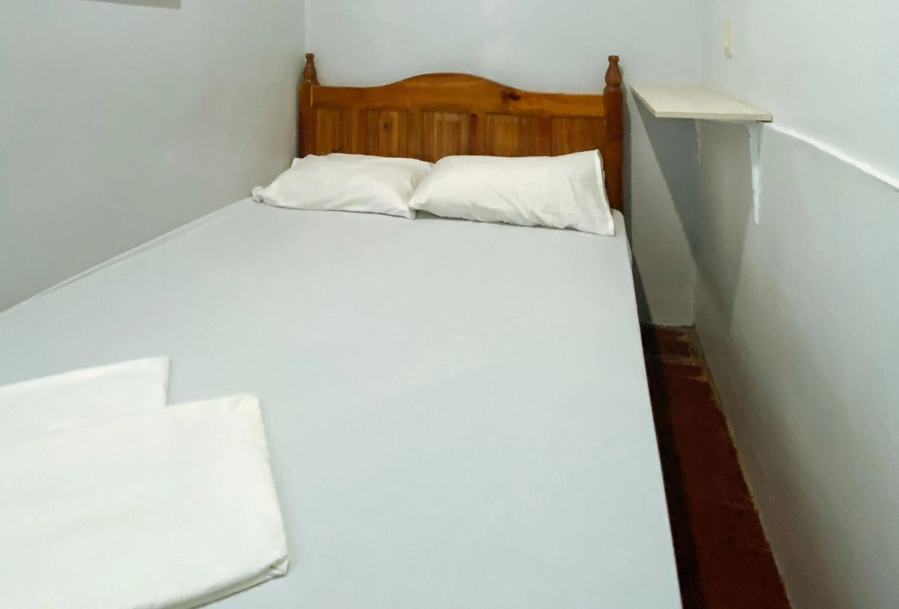 Bed in UrbanView BNKY Bed and Breakfast Palawan by RedDoorz
