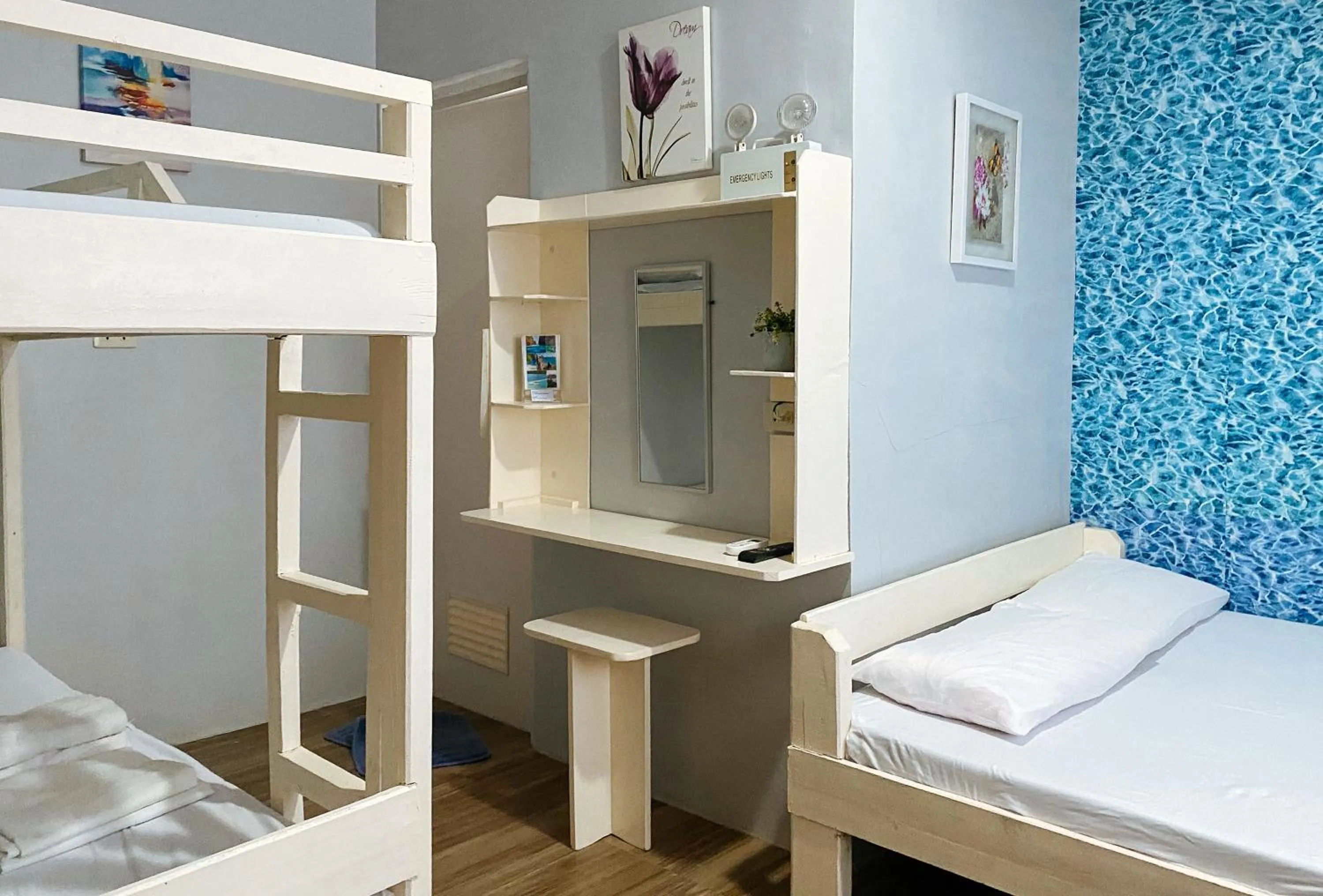 Photo of the whole room, Bed in UrbanView BNKY Bed and Breakfast Palawan by RedDoorz