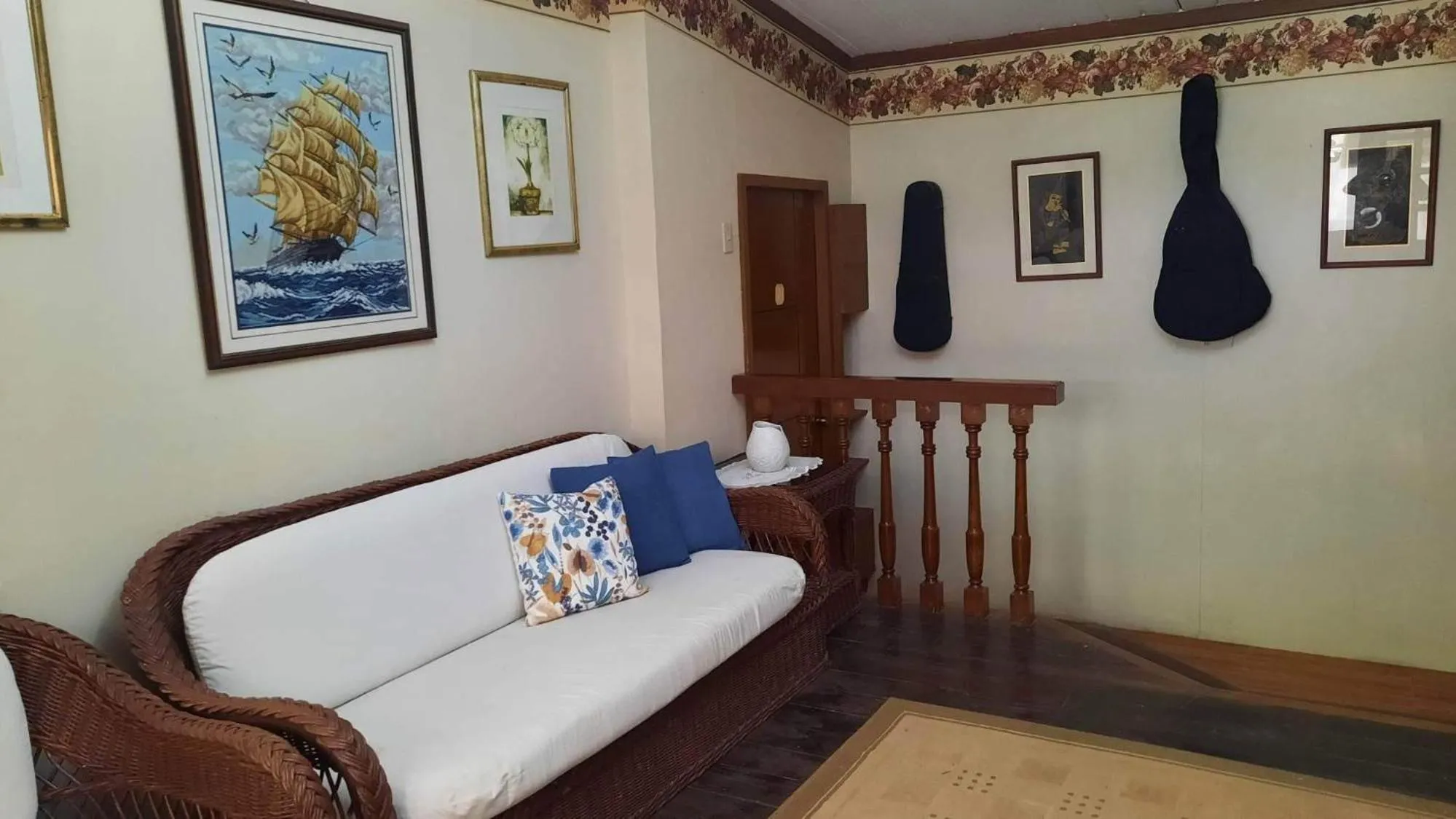 Living room in UrbanView BNKY Bed and Breakfast Palawan by RedDoorz