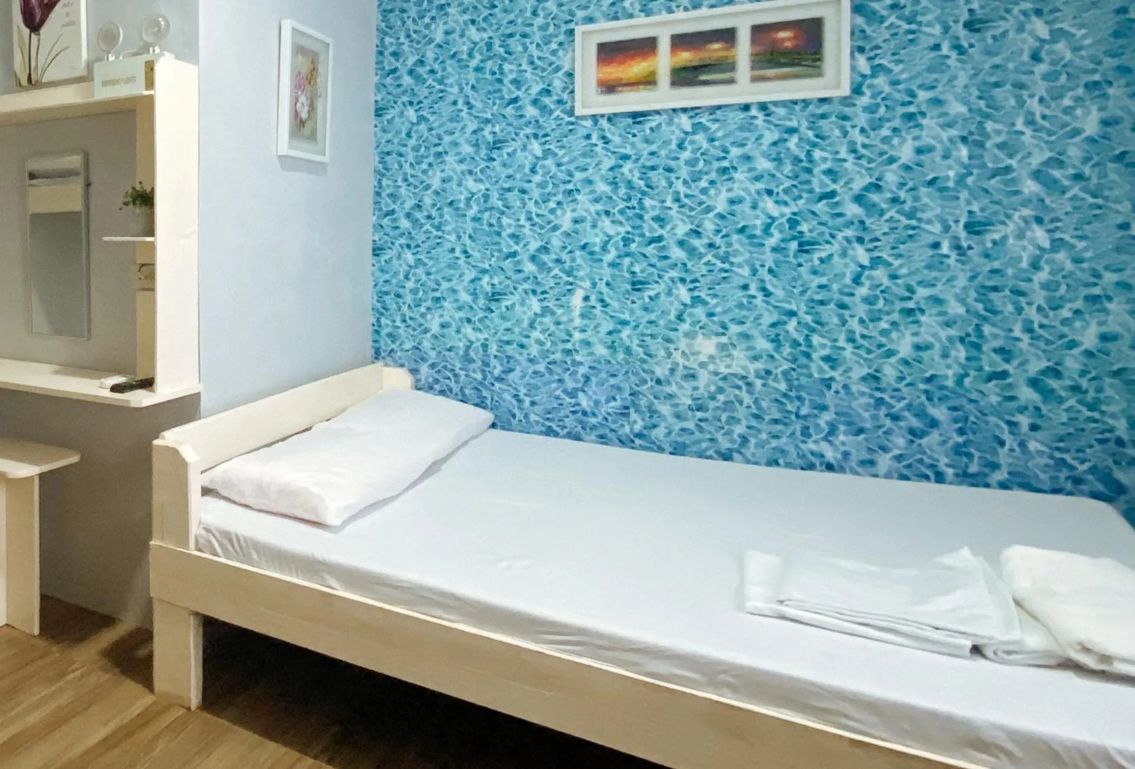 Photo of the whole room, Bed in UrbanView BNKY Bed and Breakfast Palawan by RedDoorz