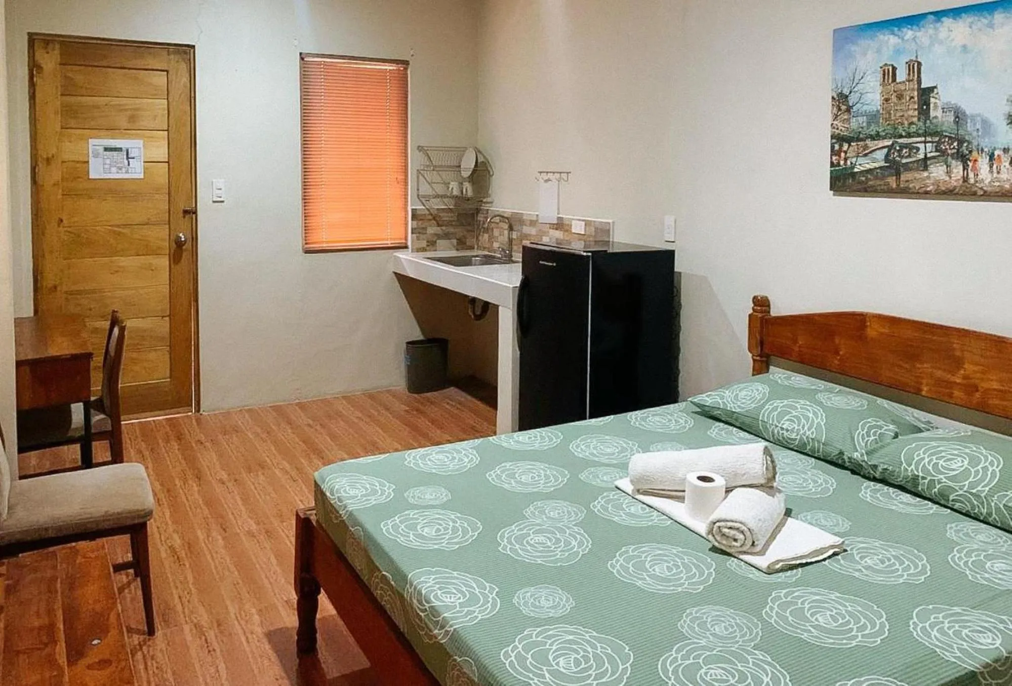 Kitchen or kitchenette, Bed in UrbanView BNKY Bed and Breakfast Palawan by RedDoorz