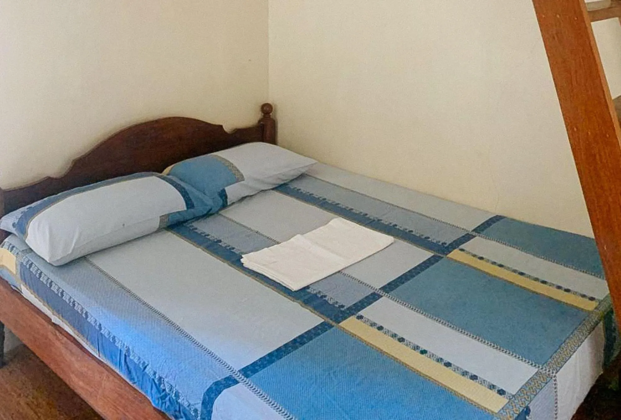 Bed in UrbanView BNKY Bed and Breakfast Palawan by RedDoorz