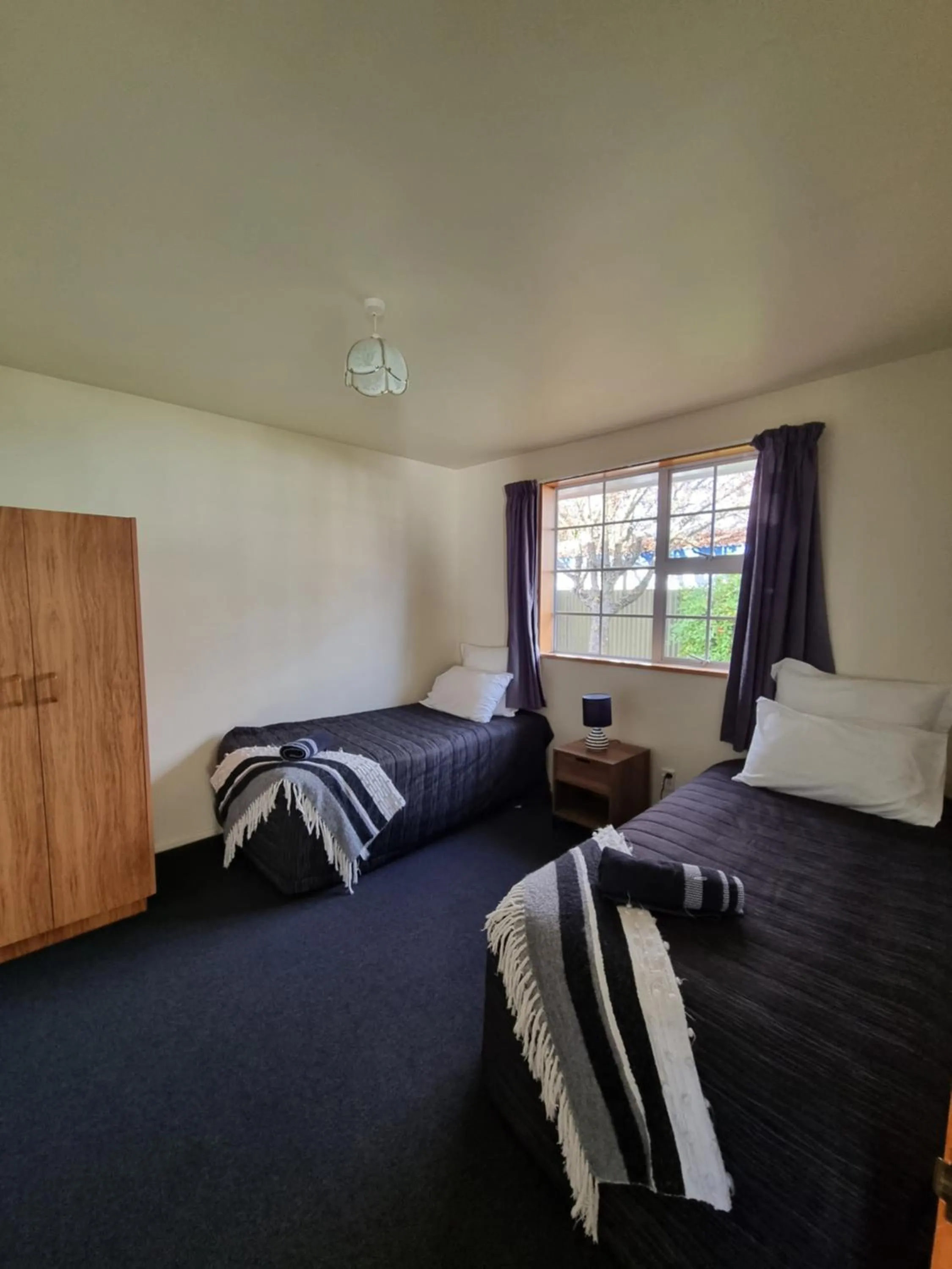 Bed in Colonial Motel