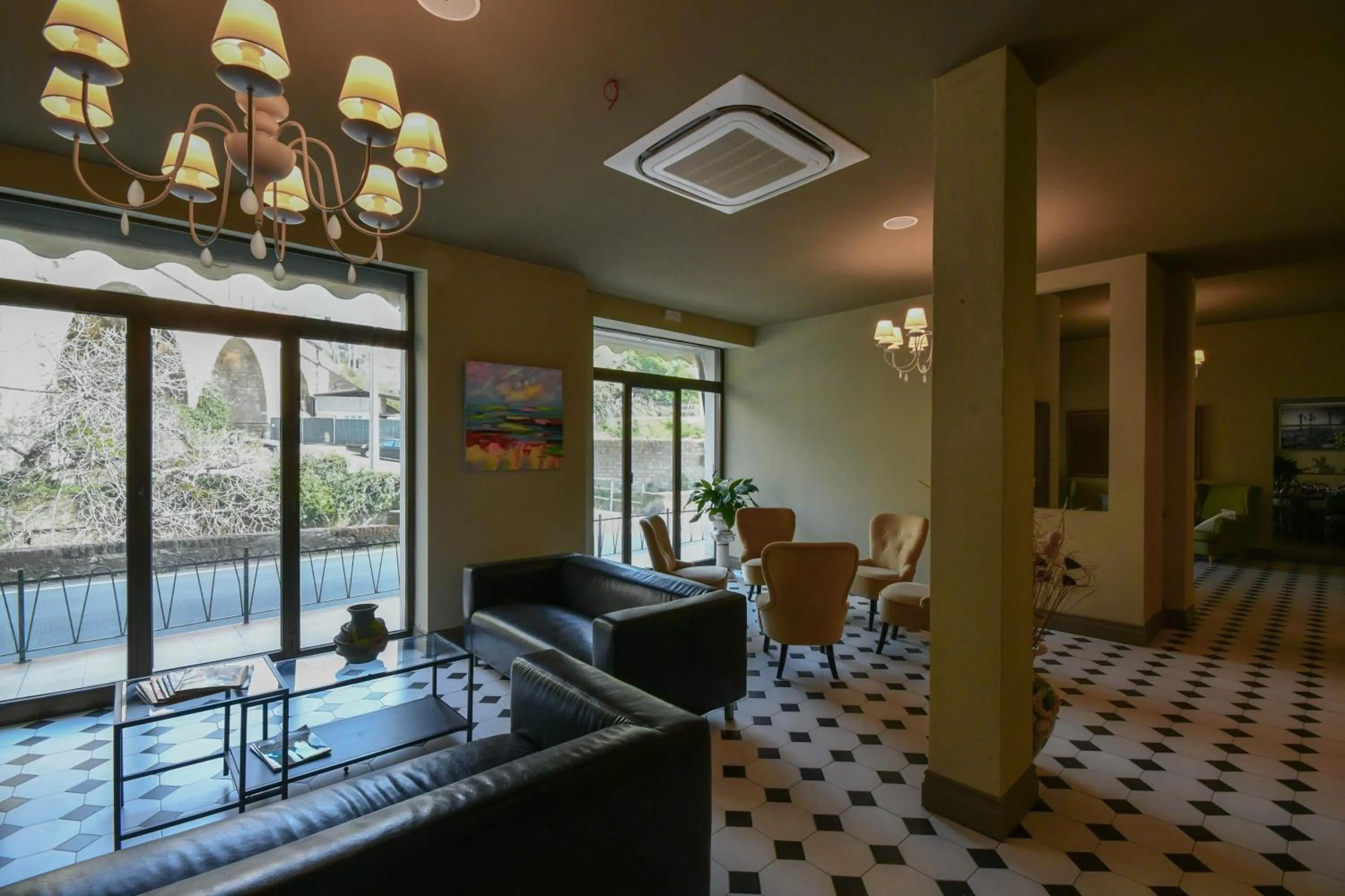 Communal lounge/ TV room in Hotel Residence Paradiso