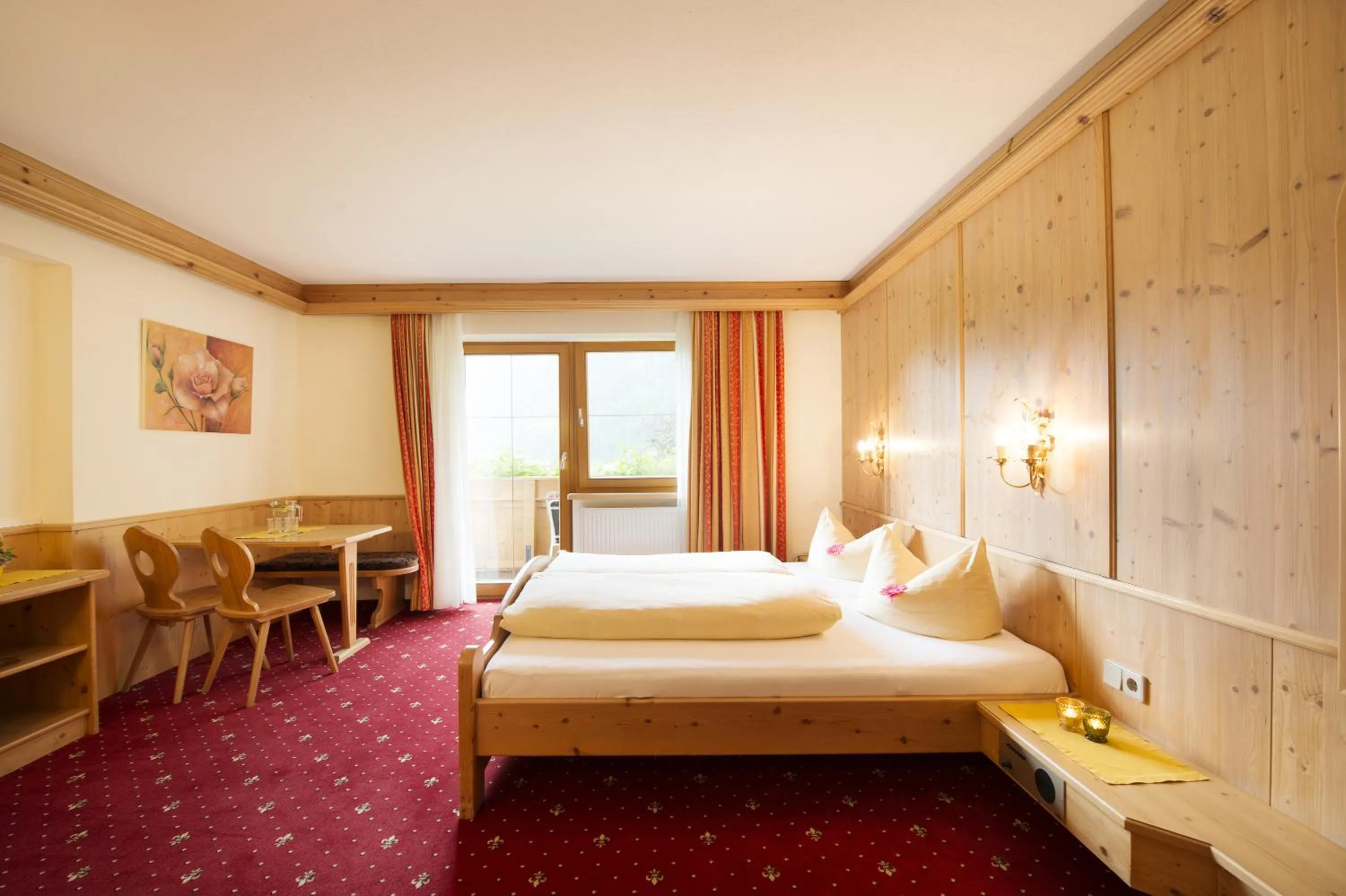 Bed in Alpenpension Pfurtscheller