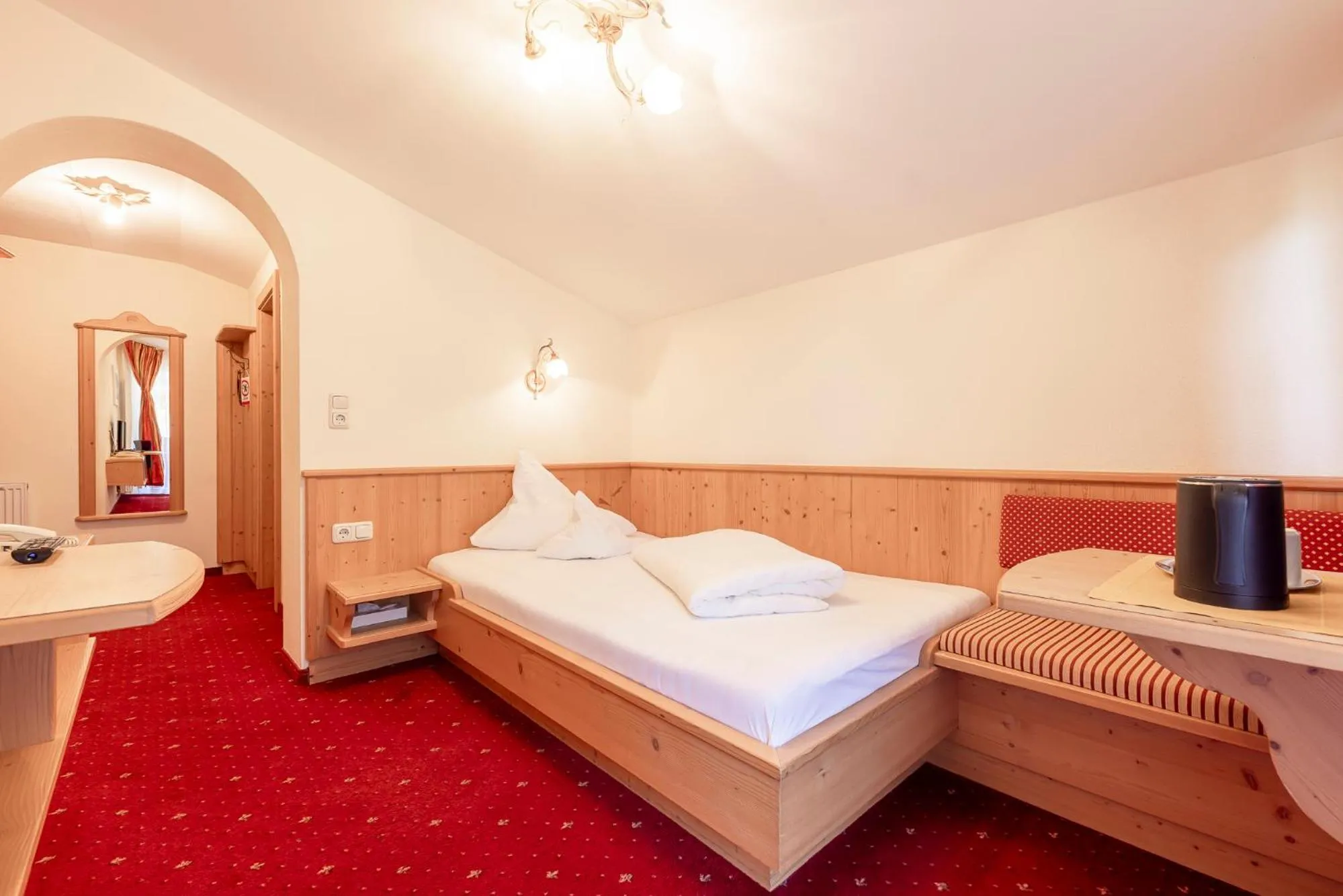 Living room, Bed in Alpenpension Pfurtscheller