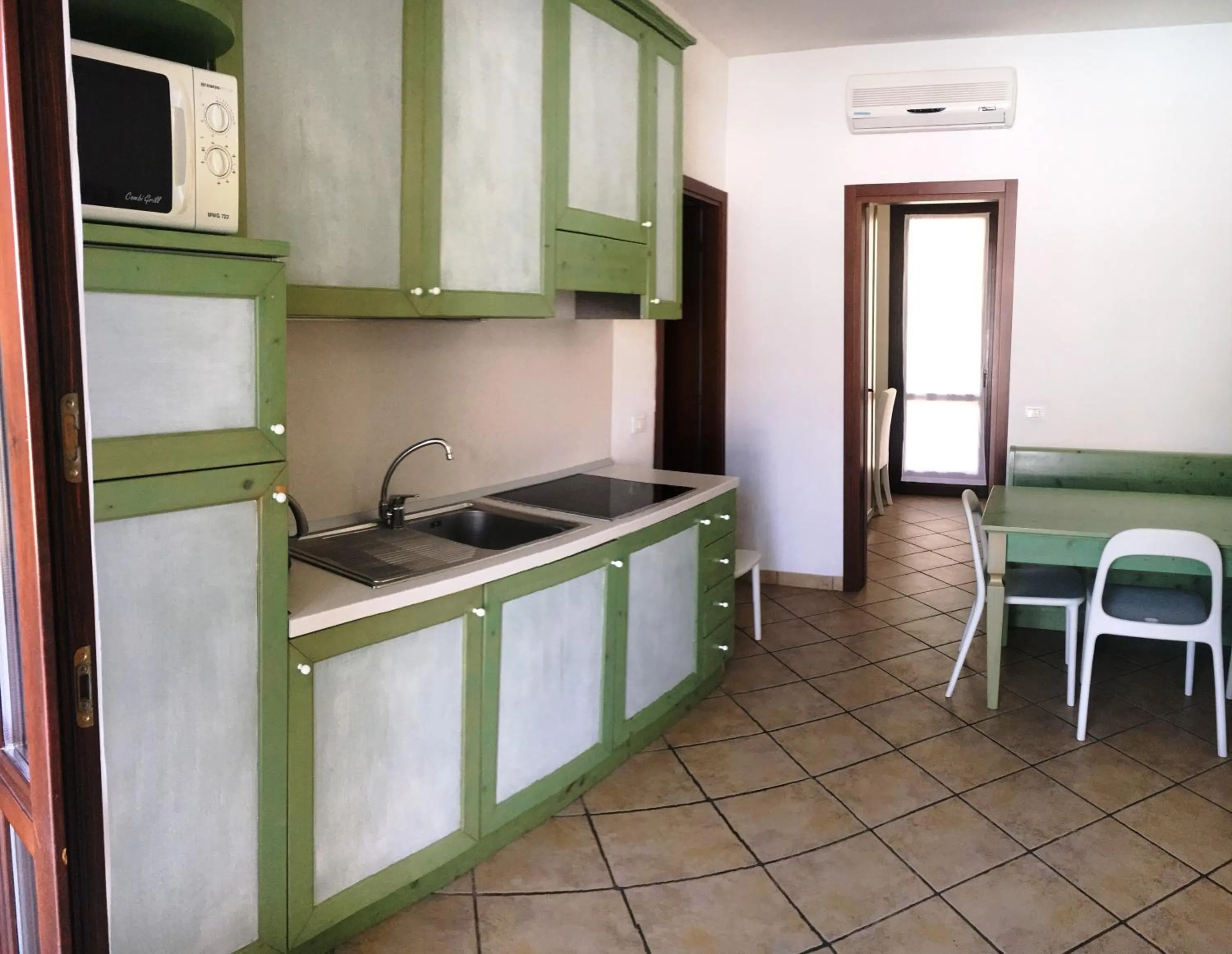 Kitchen or kitchenette in Michelangelo Holiday & Family Resort