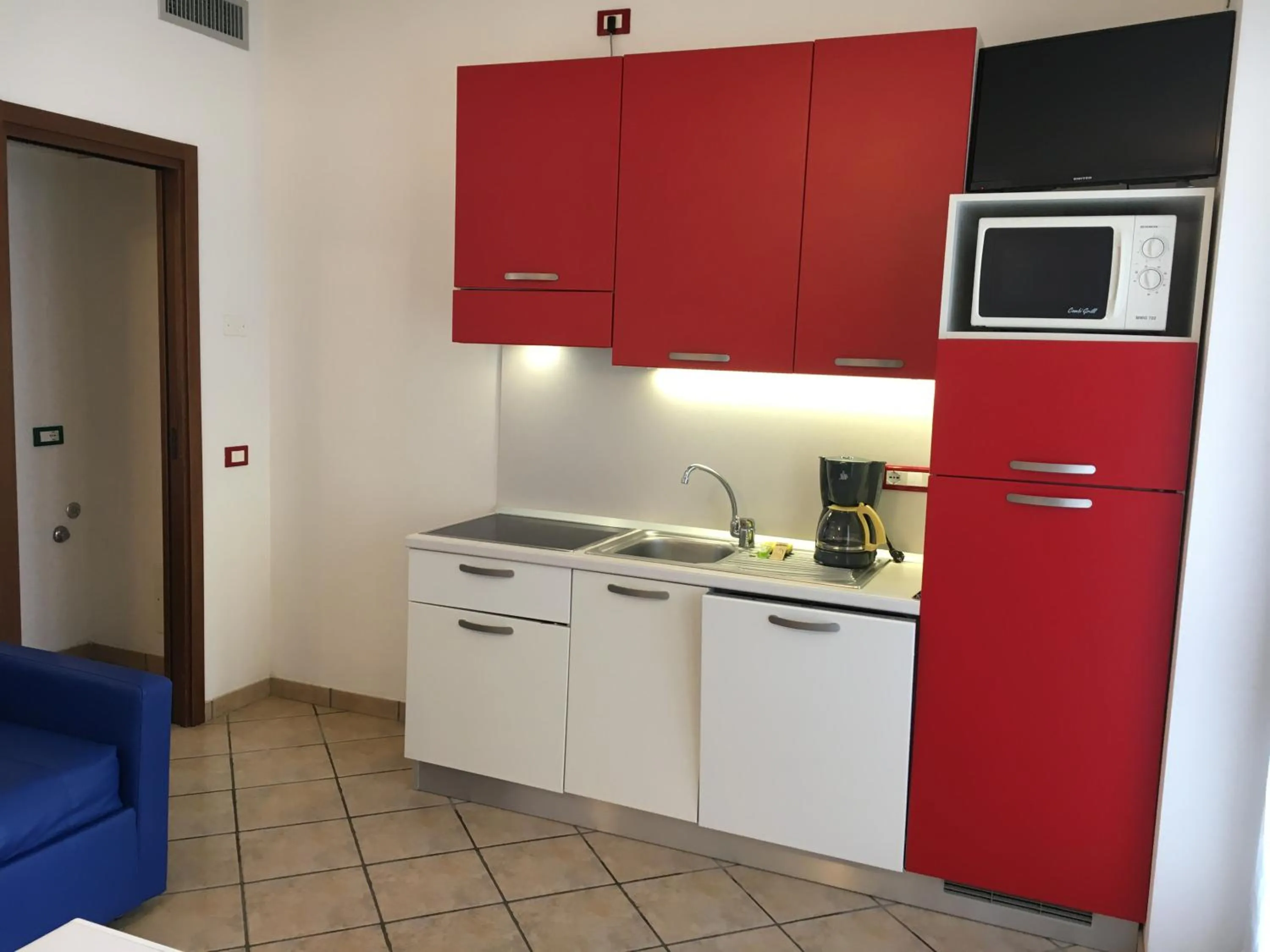 Kitchen or kitchenette in Michelangelo Holiday & Family Resort