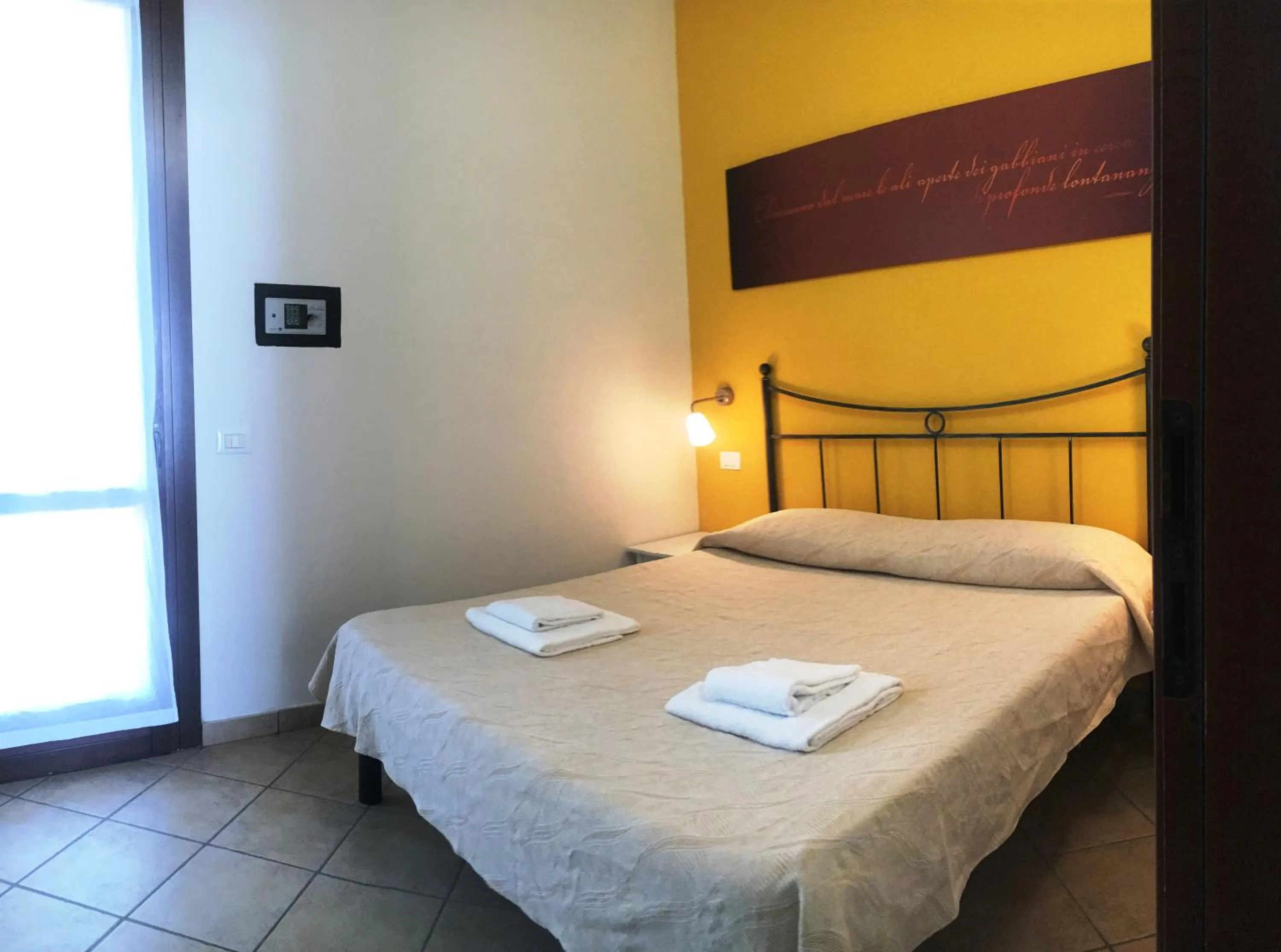 Bed in Michelangelo Holiday & Family Resort