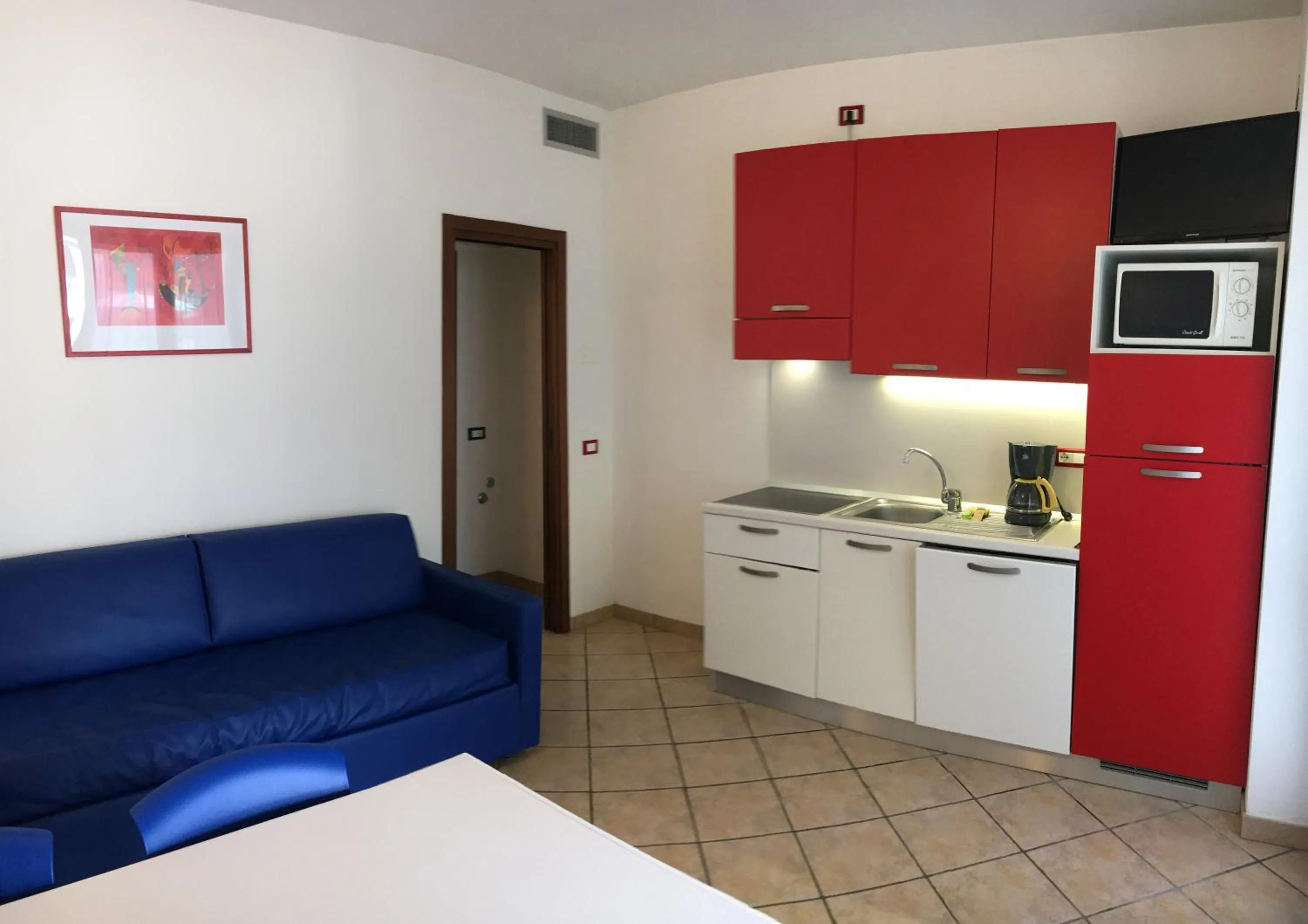 Kitchen or kitchenette in Michelangelo Holiday & Family Resort