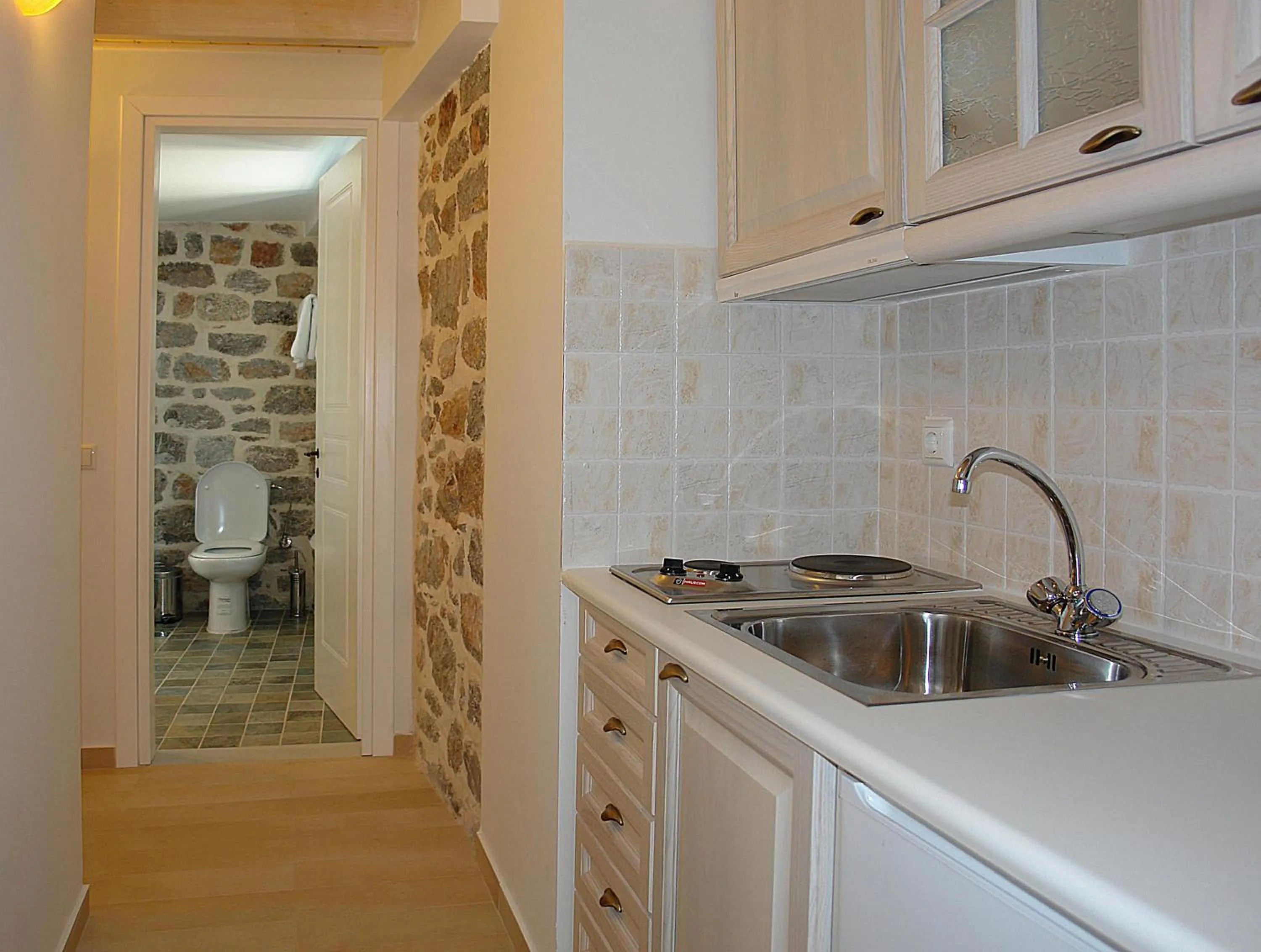 Kitchen or kitchenette in PortaDelMare deluxe suites