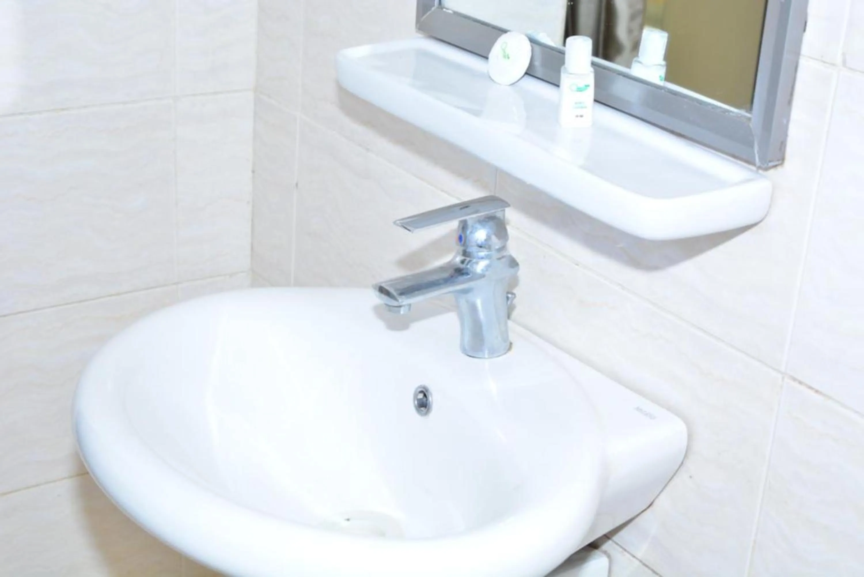 Bathroom in Omega Gardens Hotel