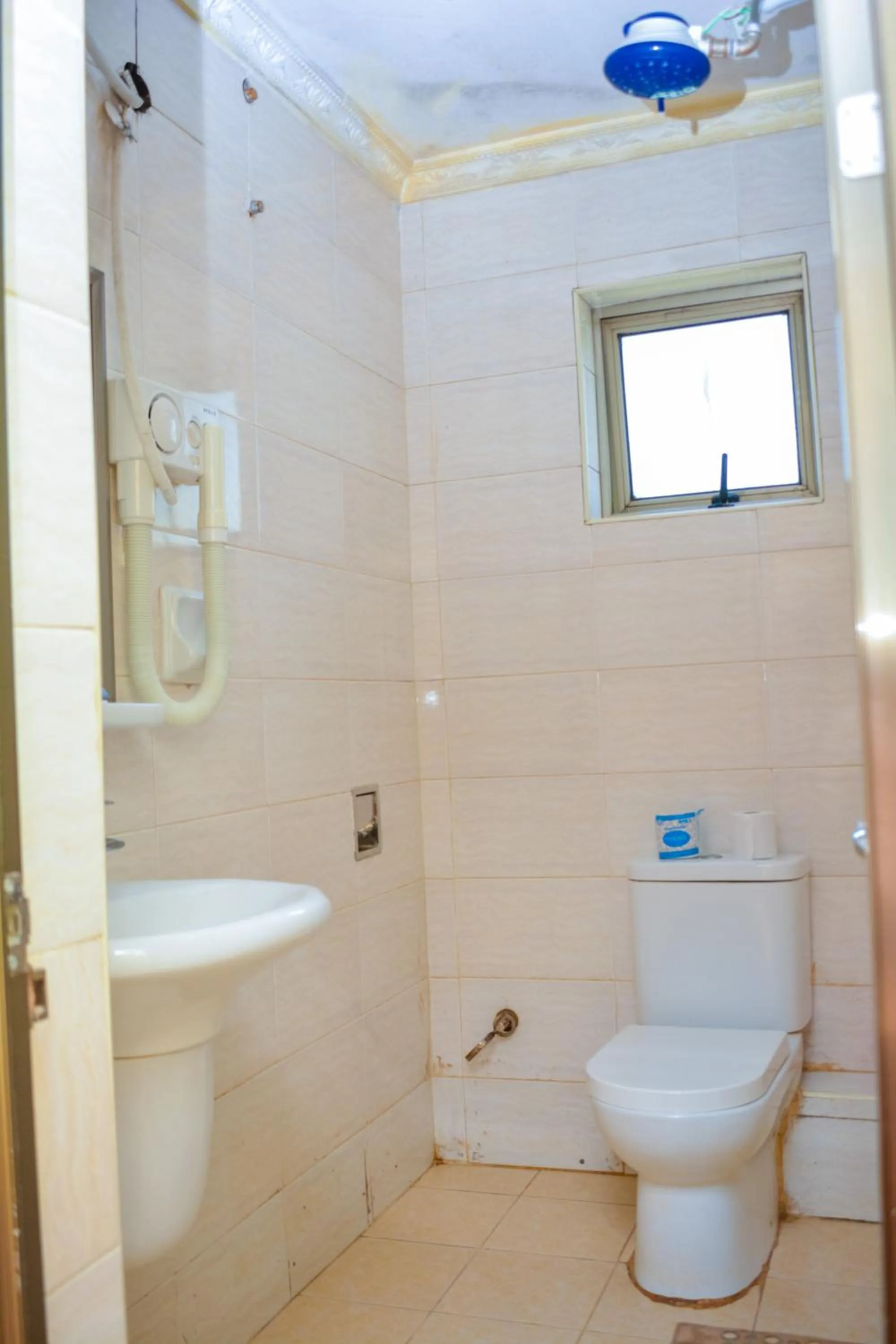 Shower in Omega Gardens Hotel