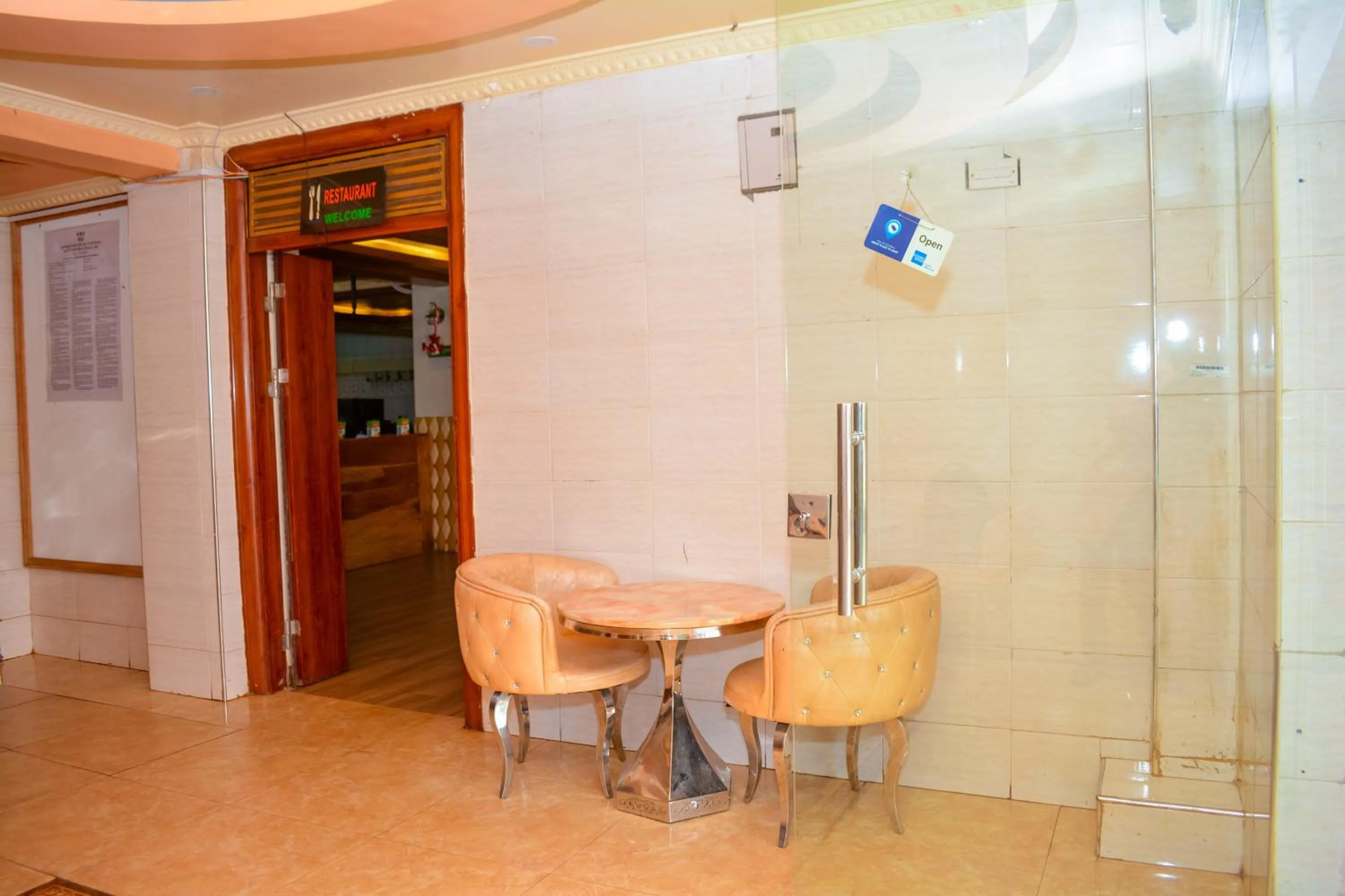 Seating area in Omega Gardens Hotel