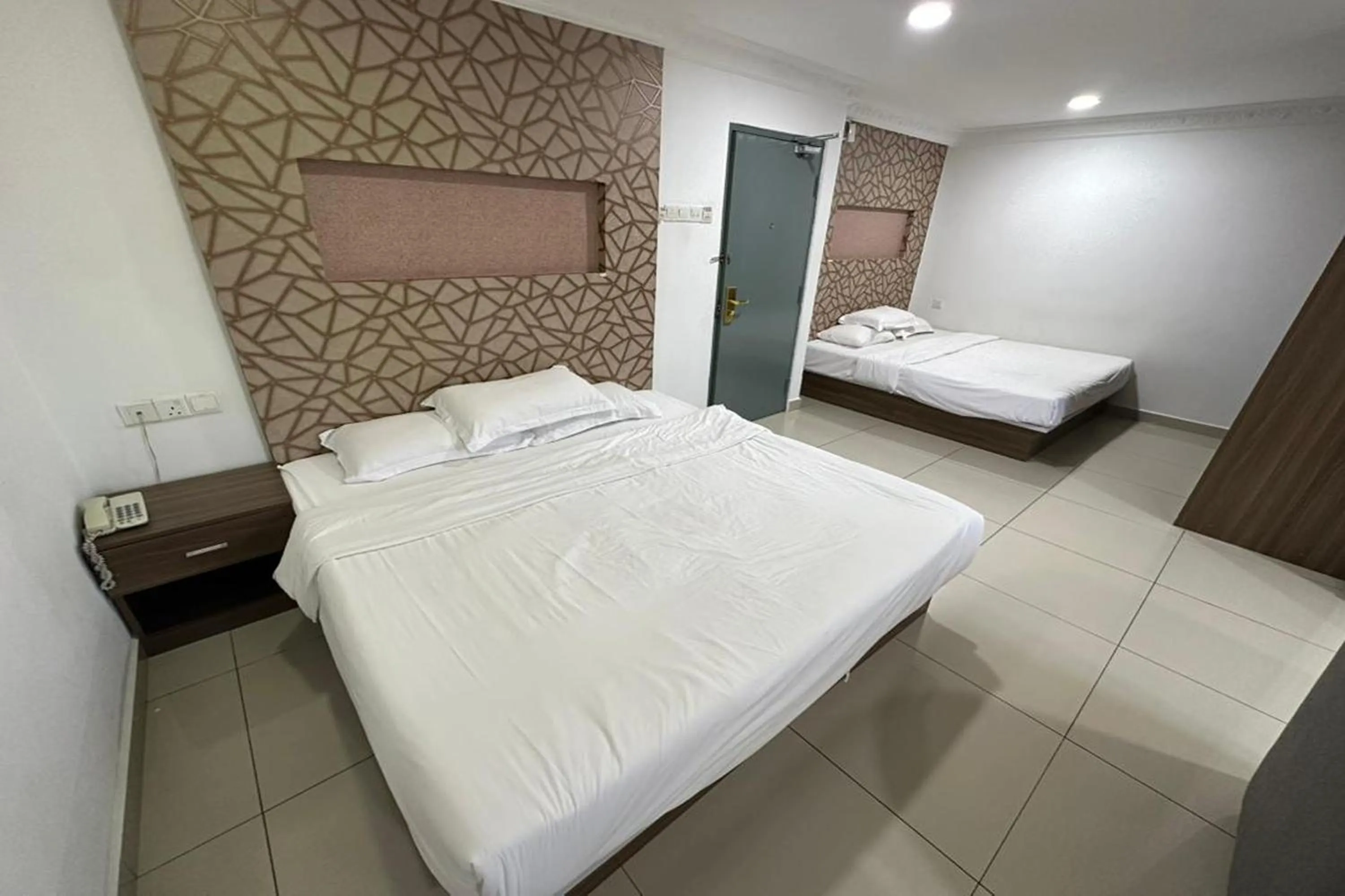 Bedroom, Bed in Poorna Hotel