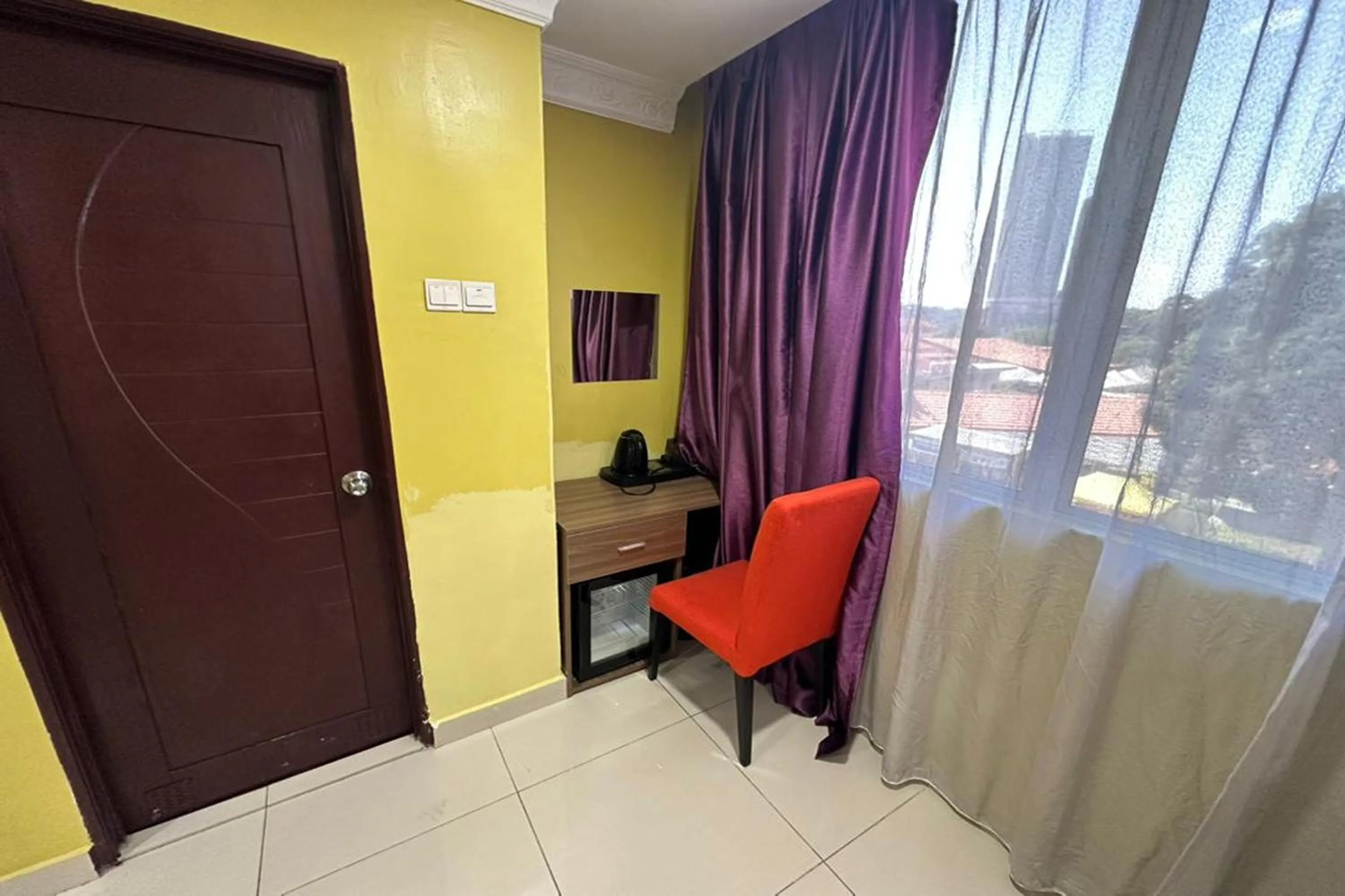 Bedroom in Poorna Hotel